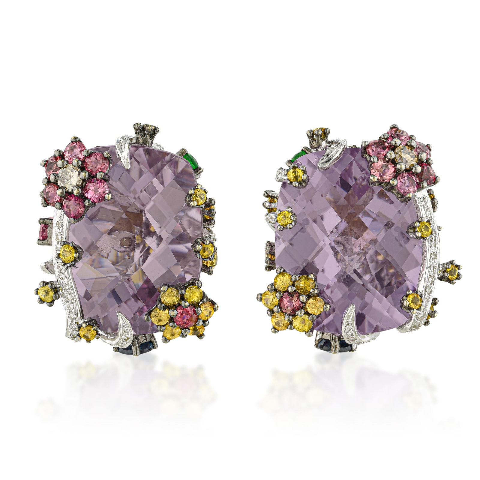 Kunzite and Sapphire Floral Earrings: ESTIMATED RETAIL PRICE: $7,000* *This is the estimated value a piece of similar quality, craftsmanship, and characteristics could command at retail. Kunzite's color exists in its own register