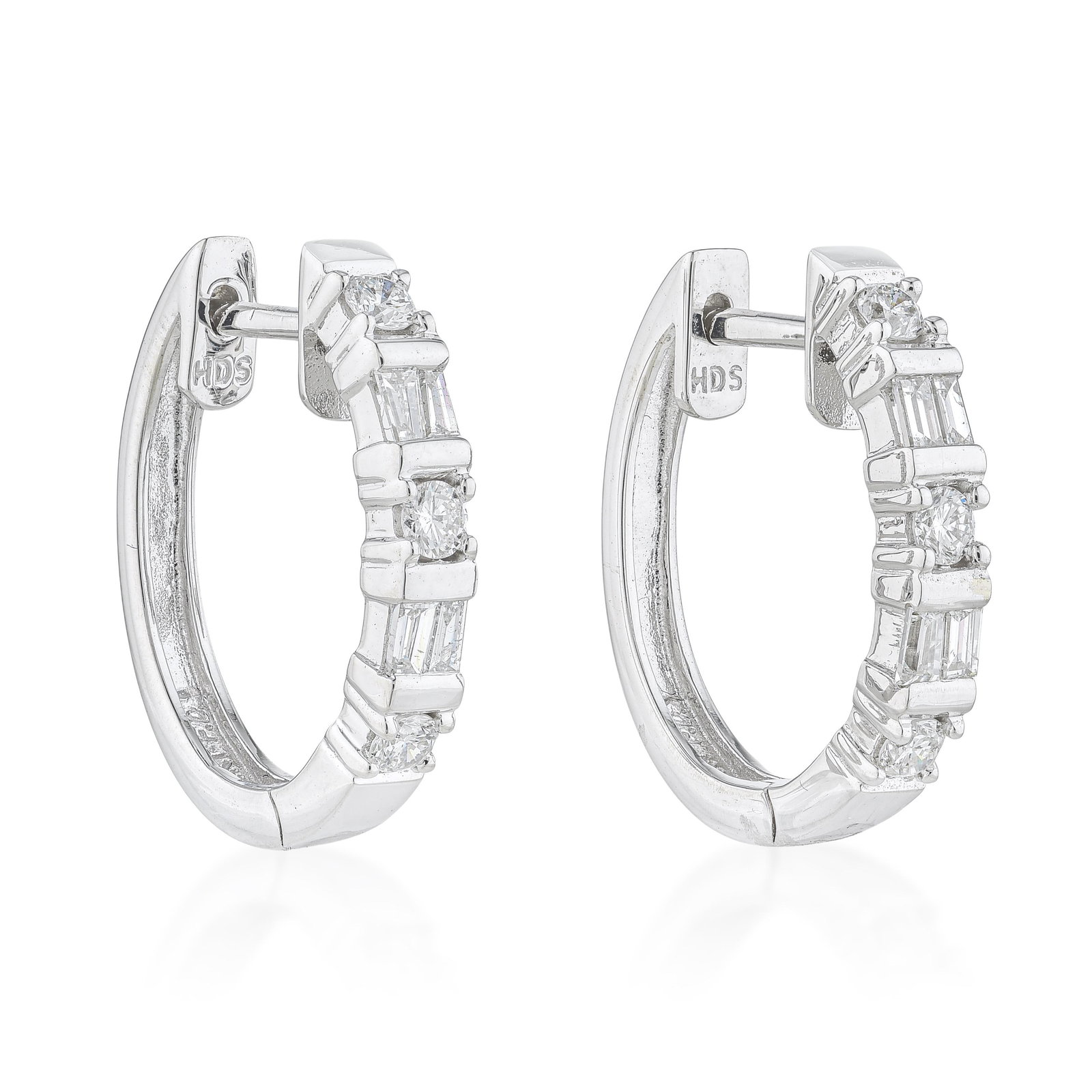 Diamond Hoop Earrings: ESTIMATED RETAIL PRICE: $1,800* *This is the estimated value a piece of similar quality, craftsmanship, and characteristics could command at retail. Mixed-shape diamonds set along the outer edge