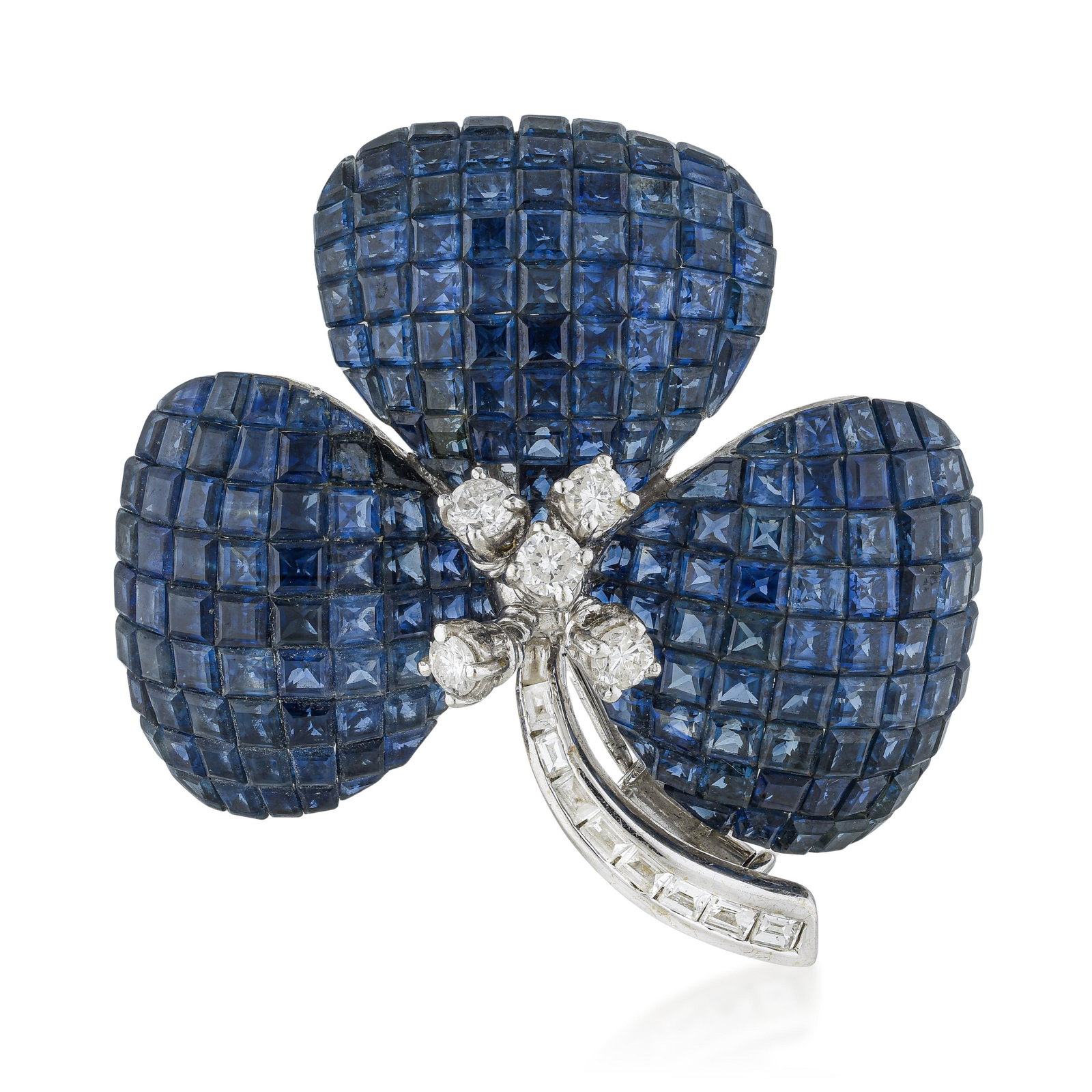Invisibly Set Sapphire and Diamond Clover Pin: ESTIMATED RETAIL PRICE: $11,000* *This is the estimated value a piece of similar quality, craftsmanship, and characteristics could command at retail. Approximately 35.65 carats of invisibly