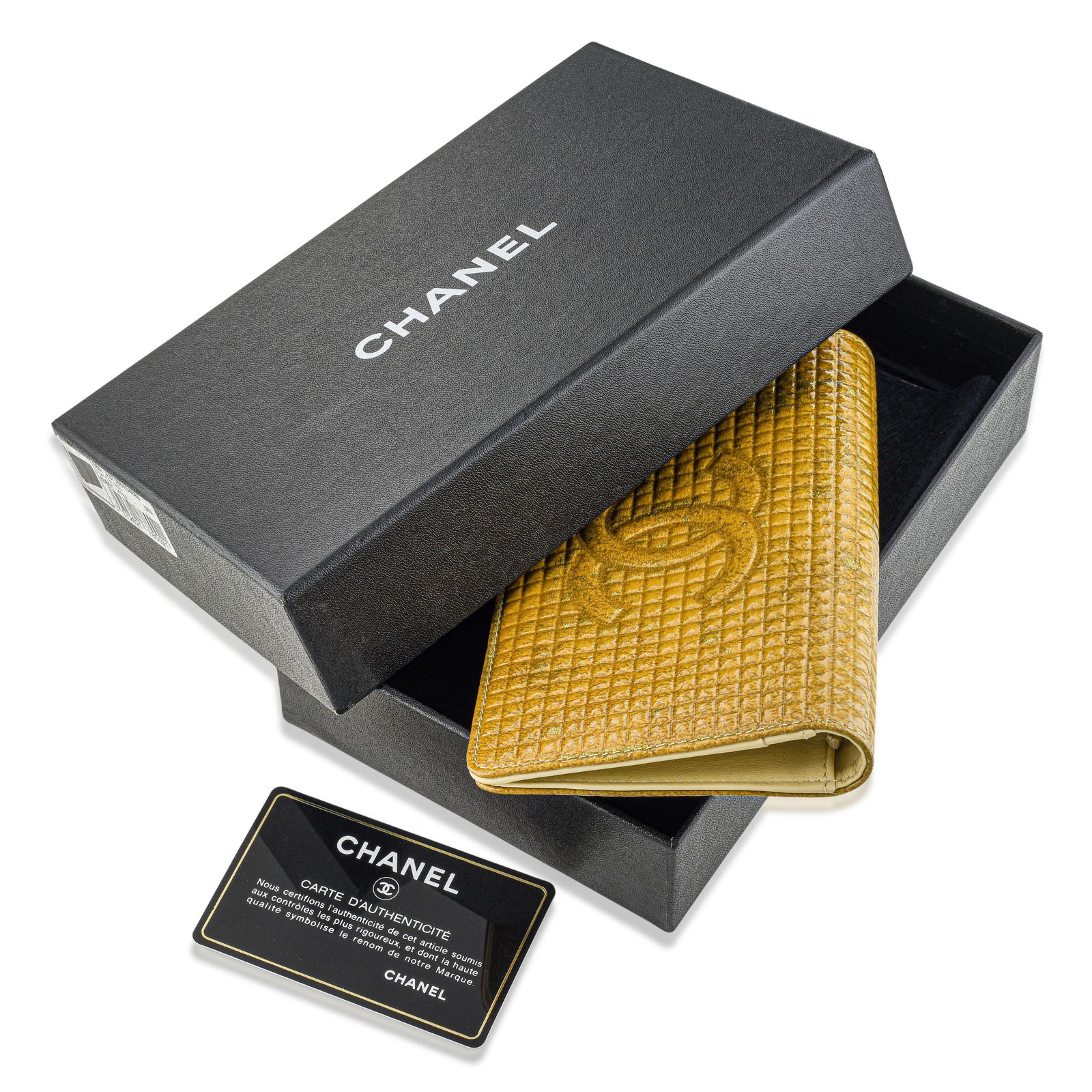 Chanel Chocobar Wallet Patent Leather, Beige: ESTIMATED RETAIL PRICE: $700* *This is the estimated value a piece of similar quality, craftsmanship, and characteristics could command at retail. The Chanel Chocolate Bar takes its name from the
