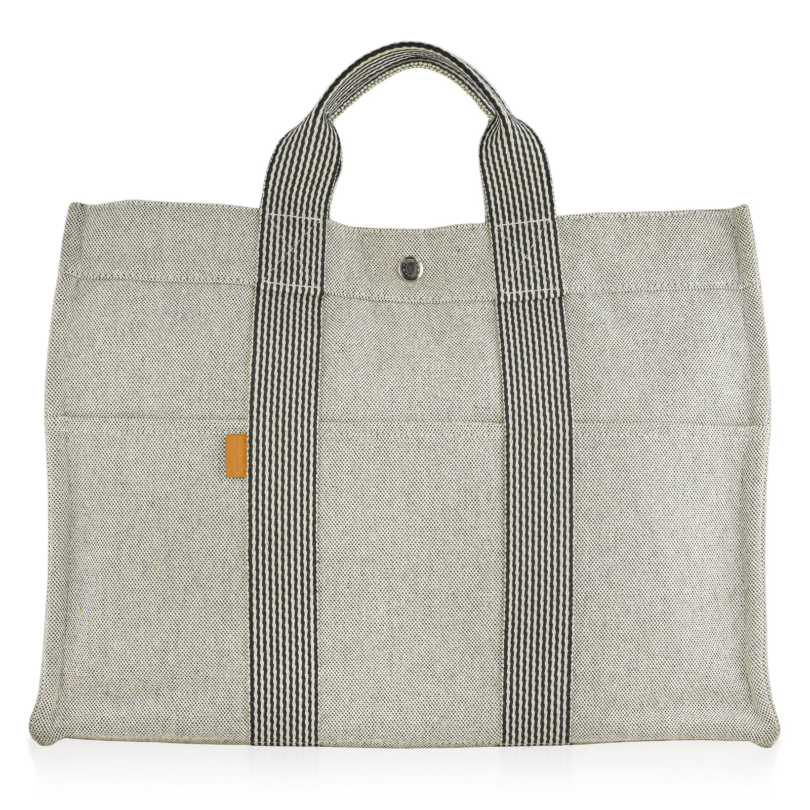 Hermes Fourre Tout MM Canvas Tote, Gray/Navy Stripe: ESTIMATED RETAIL PRICE: $450* *This is the estimated value a piece of similar quality, craftsmanship, and characteristics could command at retail. The Fourre Tout (French for "catch-all") is one