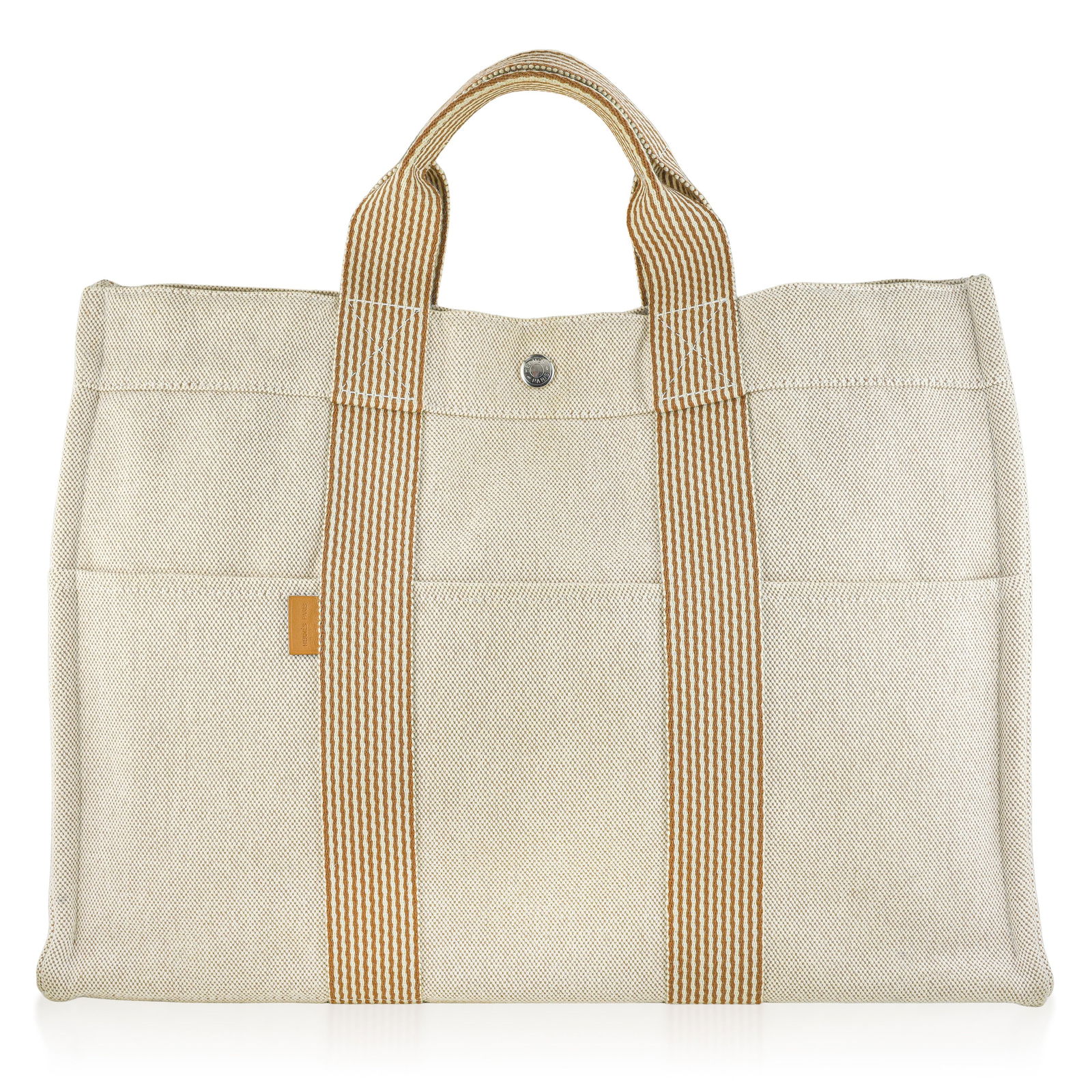 Hermes Fourre Tout MM Canvas Tote, Natural/Ecru with Gold Stripe: ESTIMATED RETAIL PRICE: $400* *This is the estimated value a piece of similar quality, craftsmanship, and characteristics could command at retail. The Fourre Tout (French for "catch-all") is one