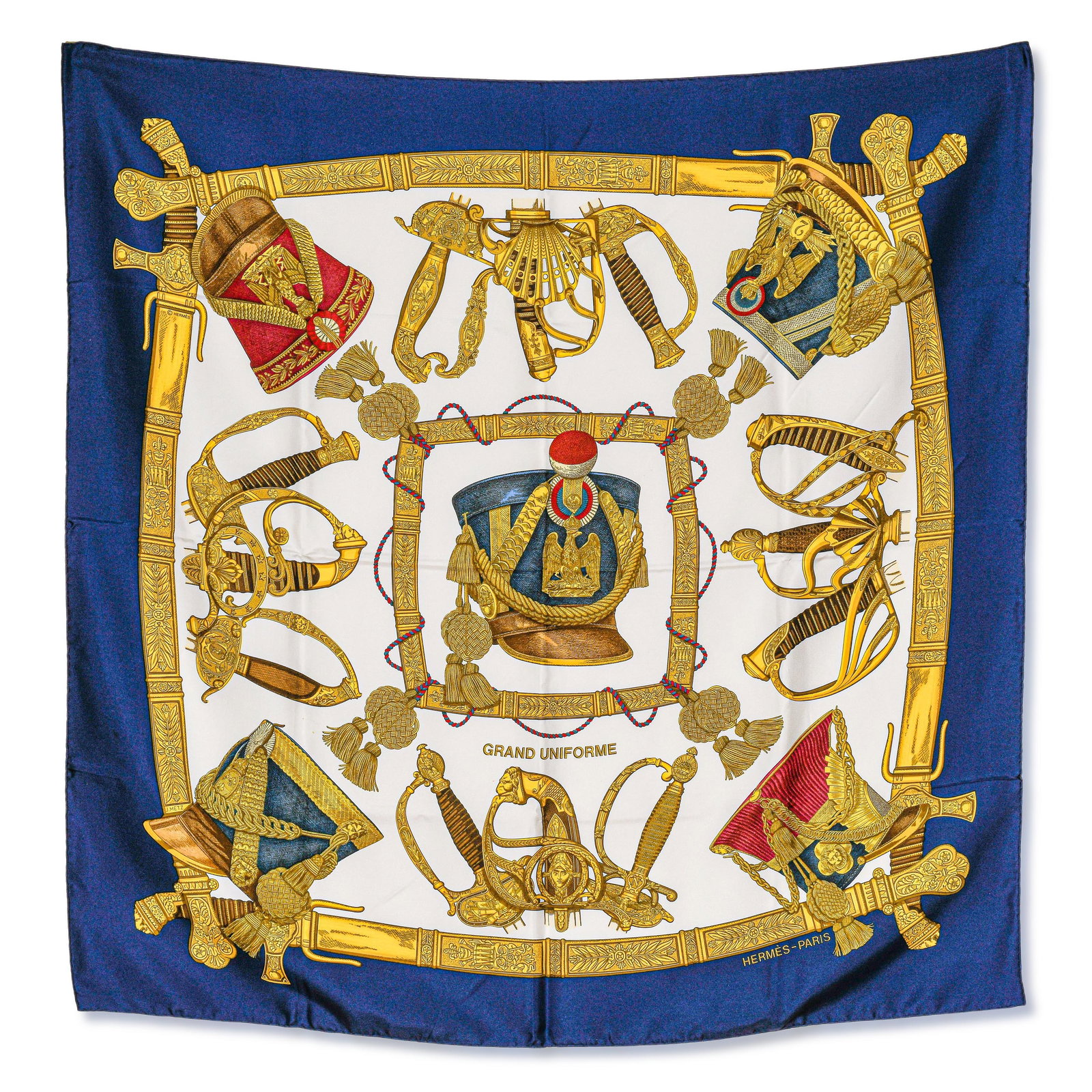 Hermes "Grand Uniforme" Silk Scarf, with Box: Artist: Joachim Metz First Issued: 1985 (This example: c. 1990–1999 Reissue) The Design A theatrical celebration of Napoleonic military pageantry, Grand Uniforme showcases the ornate dress uni