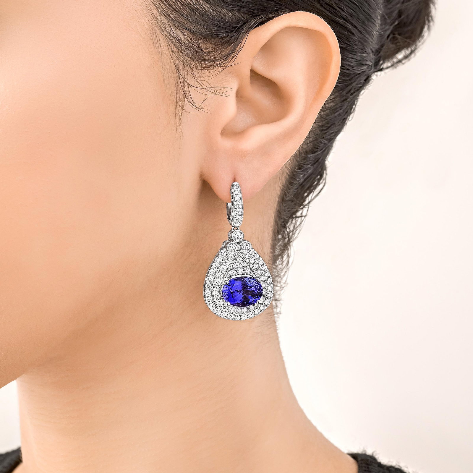 Tanzanite and Diamond Earrings: ESTIMATED RETAIL PRICE: $22,000* *This is the estimated value a piece of similar quality, craftsmanship, and characteristics could command at retail. Tanzanite was only discovered in 1967, making it