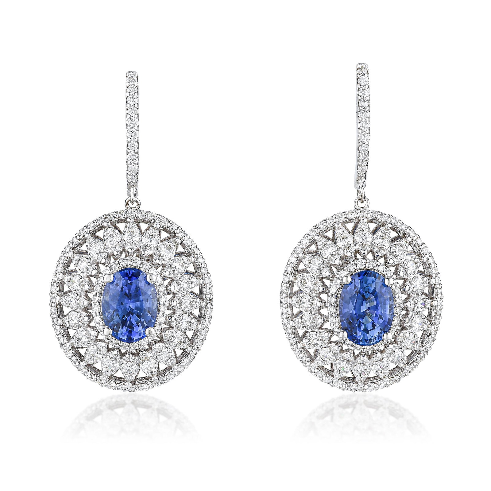 Diamond and Sapphire Drop Earrings: ESTIMATED RETAIL PRICE: $13,500* *This is the estimated value a piece of similar quality, craftsmanship, and characteristics could command at retail. Blue sapphire and diamond have been jewelry's