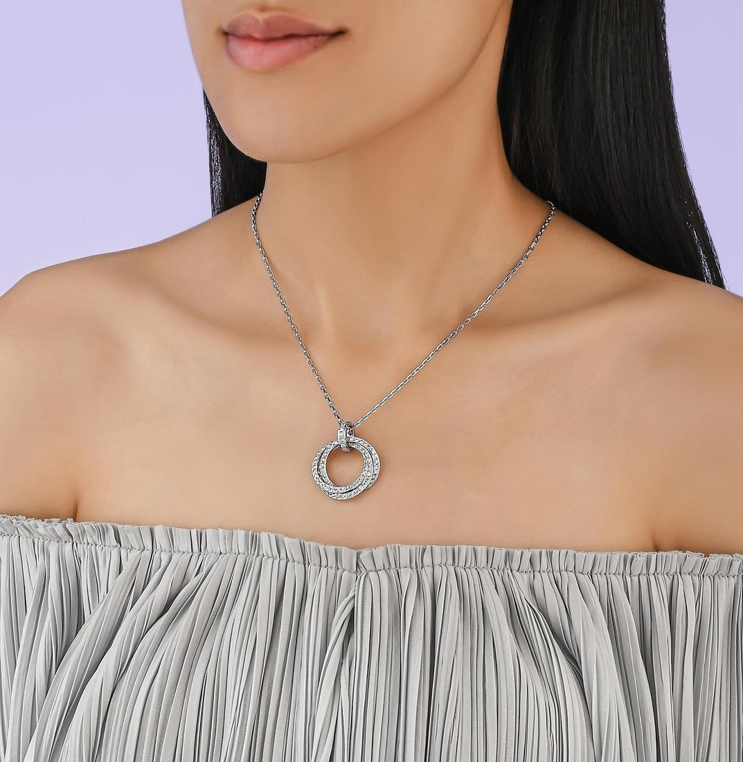 Diamond Interlocking Circles Necklace: ESTIMATED RETAIL PRICE: $7,000* *This is the estimated value a piece of similar quality, craftsmanship, and characteristics could command at retail. Nearly 3 carats of G-H/VS diamonds concentrated