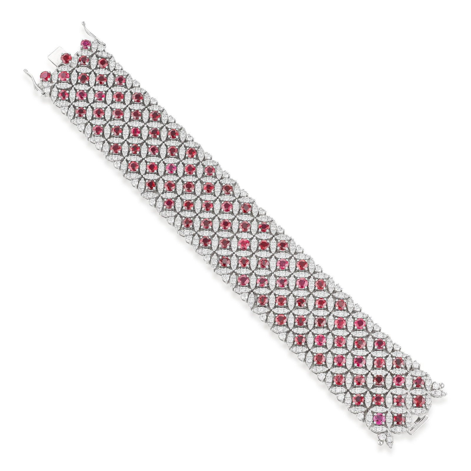 Ruby and Diamond Wide Bracelet: ESTIMATED RETAIL PRICE: $90,000* *This is the estimated value a piece of similar quality, craftsmanship, and characteristics could command at retail. Summary of Key Characteristics • Metal: