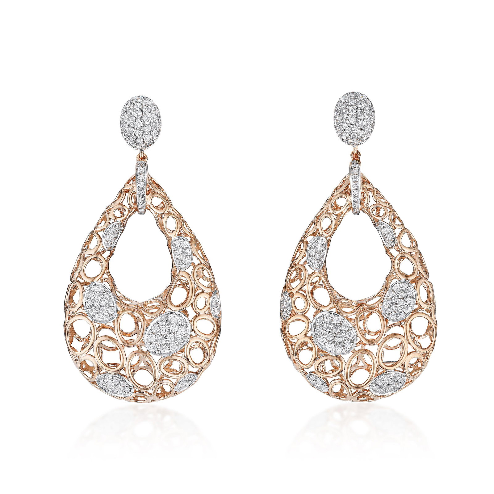 Diamond Openwork Drop Earrings: ESTIMATED RETAIL PRICE: $9,750* *This is the estimated value a piece of similar quality, craftsmanship, and characteristics could command at retail. The interplay of rose and white gold across this