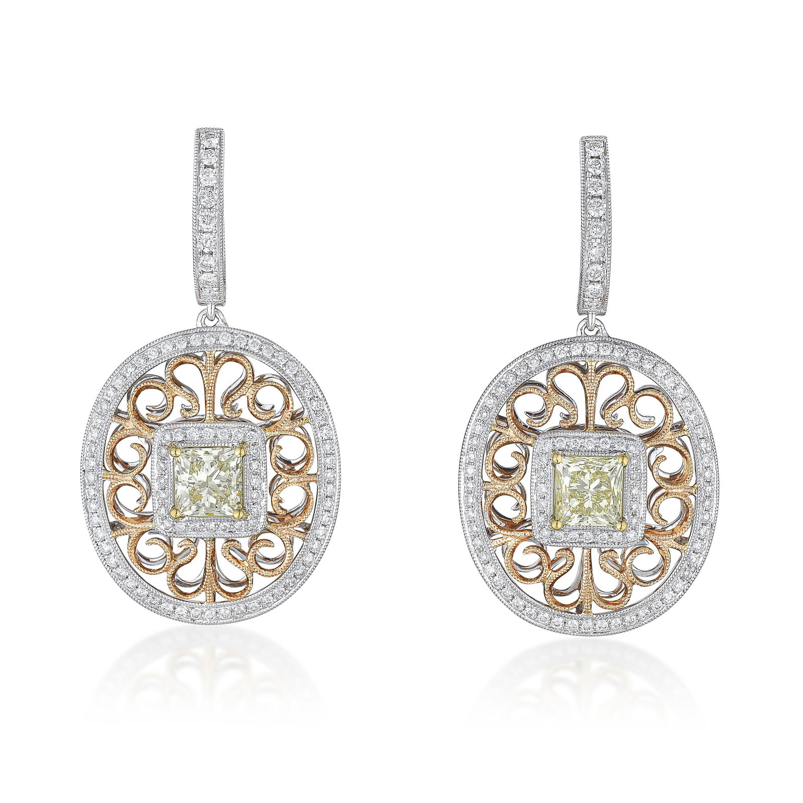 Diamond Drop Earrings: ESTIMATED RETAIL PRICE: $18,500* *This is the estimated value a piece of similar quality, craftsmanship, and characteristics could command at retail. Tri-color gold takes discipline to execute well,