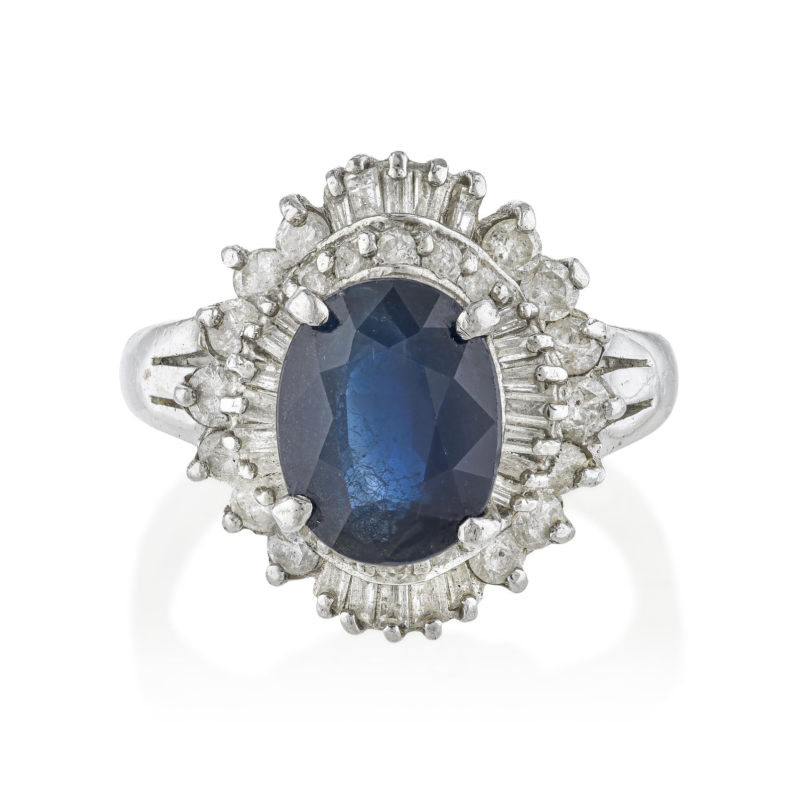 Sapphire and Diamond Ring: ESTIMATED RETAIL PRICE: $2,800* *This is the estimated value a piece of similar quality, craftsmanship, and characteristics could command at retail. The light wear consistent with age noted in the