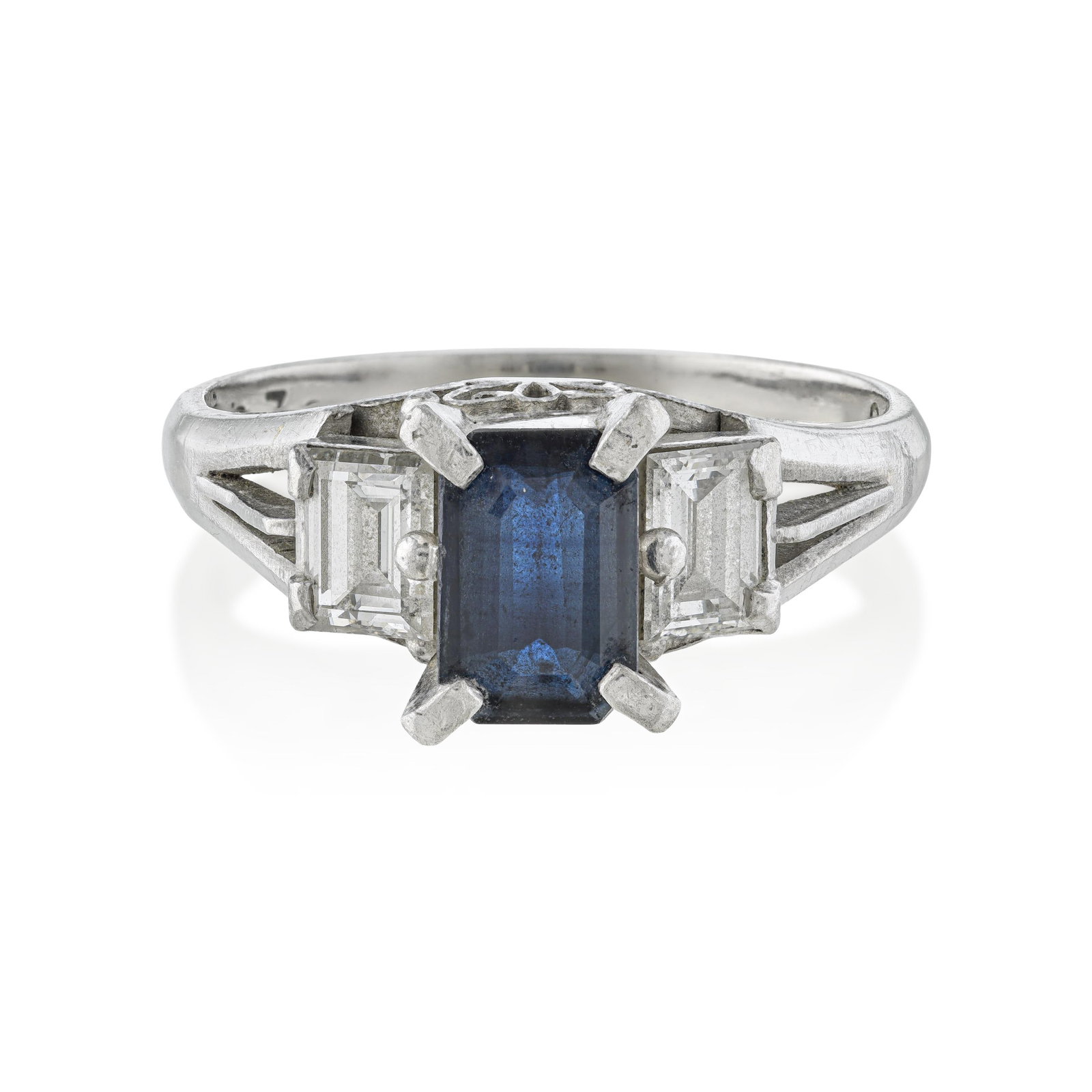 Sapphire And Diamond Ring: ESTIMATED RETAIL PRICE: $1,900* *This is the estimated value a piece of similar quality, craftsmanship, and characteristics could command at retail. An emerald-cut sapphire with emerald-cut