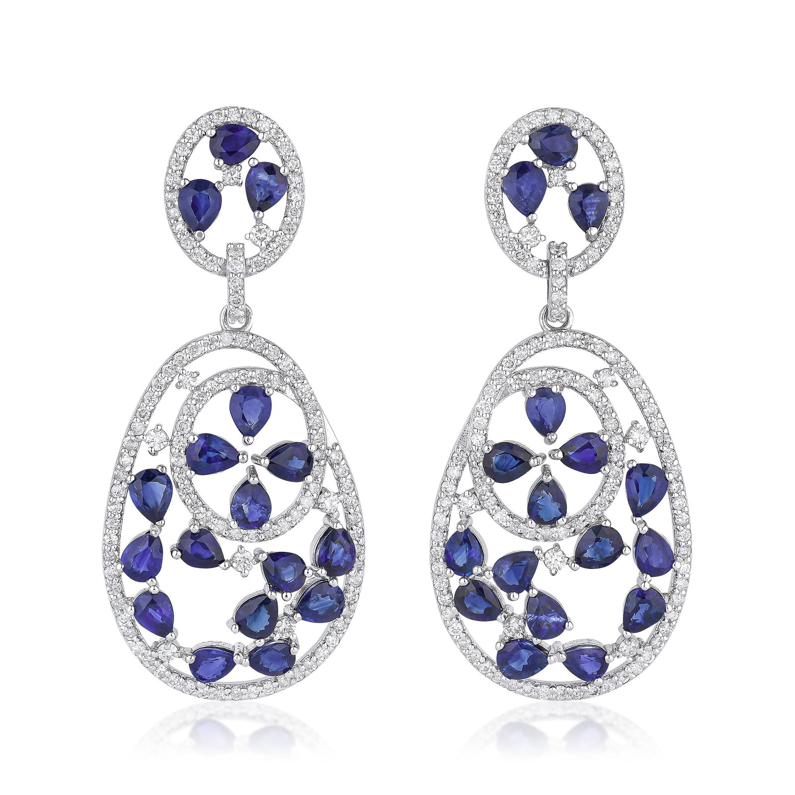 Sapphire and Diamond Earrings: ESTIMATED RETAIL PRICE: $11,000* *This is the estimated value a piece of similar quality, craftsmanship, and characteristics could command at retail. Introducing a pair of earrings with an alluring o