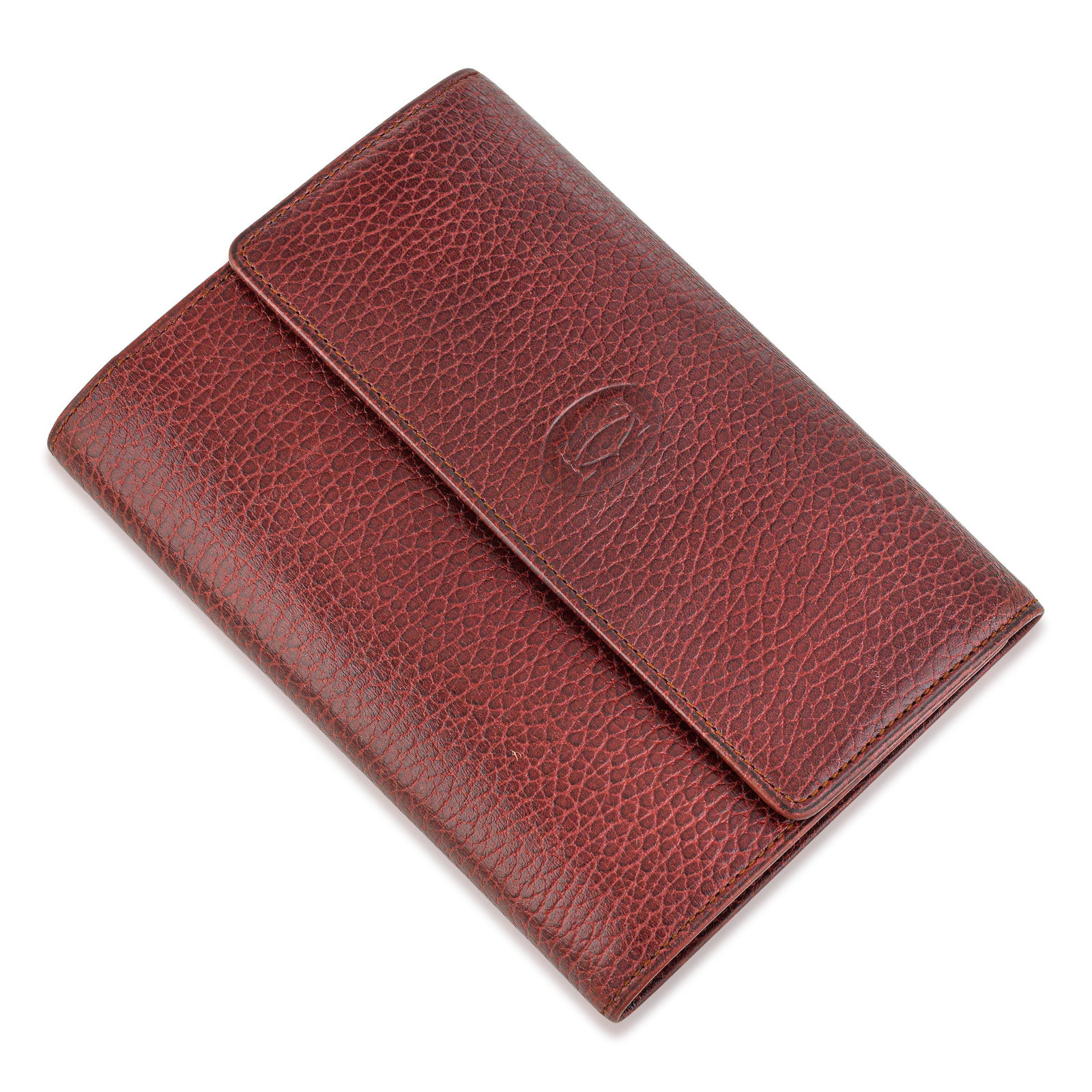 Cartier Must de Cartier Wallet – Grained Calf Leather, Bordeaux: ESTIMATED RETAIL PRICE: $650* *This is the estimated value a piece of similar quality, craftsmanship, and characteristics could command at retail. The Cartier Must de Cartier Wallet is a classic