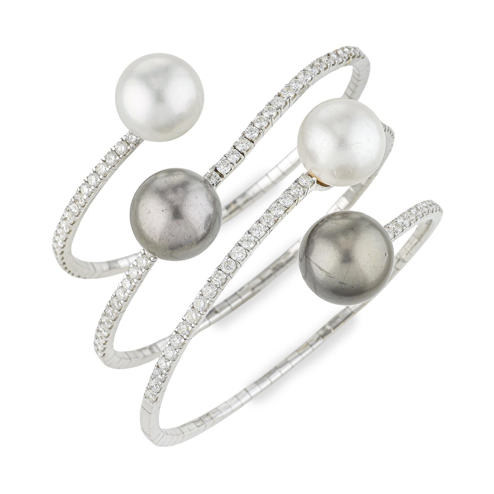 Black and White Pearl and Diamond Flexible Bangle: ESTIMATED RETAIL PRICE: $28,000* *This is the estimated value a piece of similar quality, craftsmanship, and characteristics could command at retail. Four cultured pearls at 14.5mm in diameter are