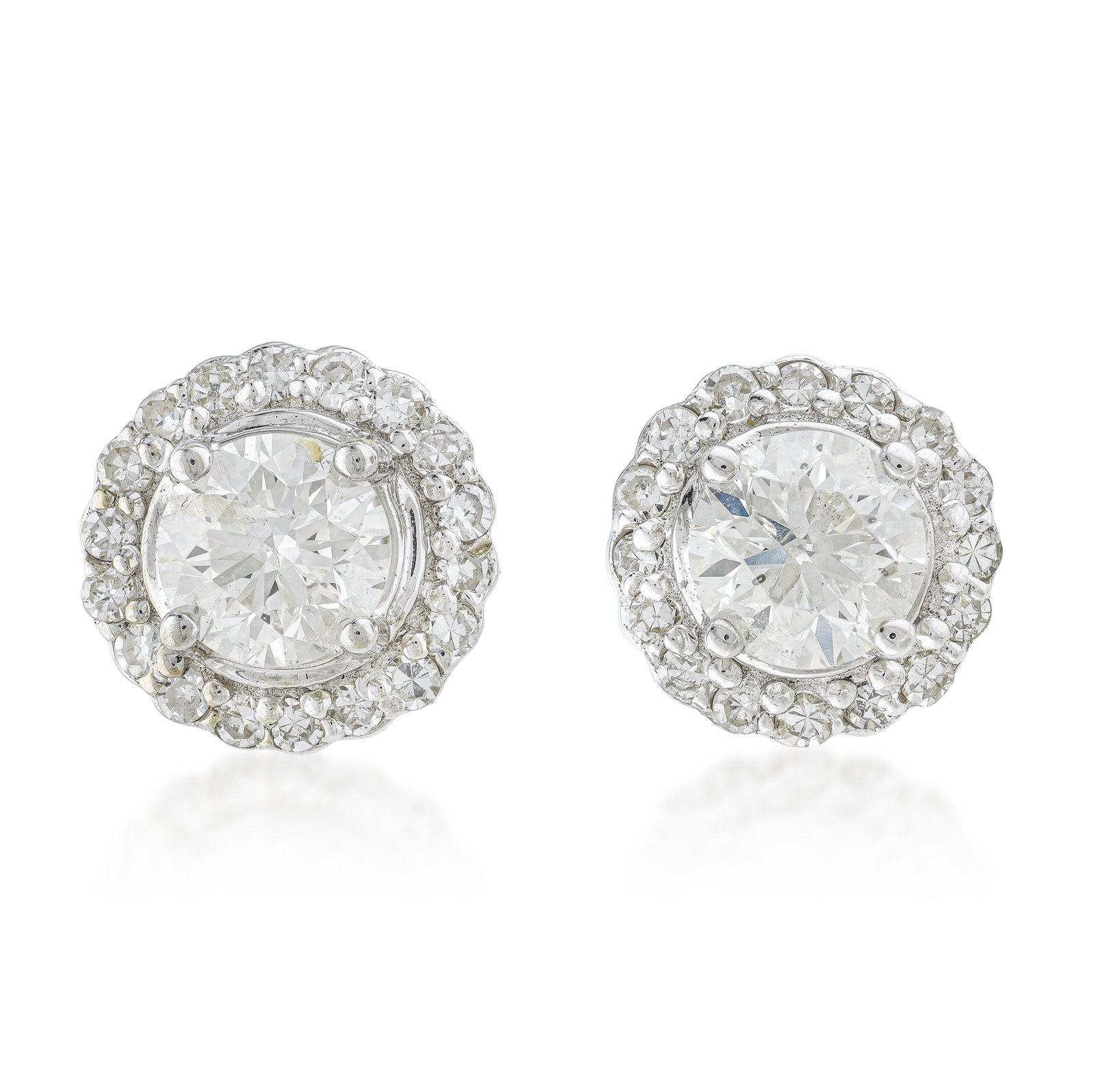 Diamond Halo Stud Earrings (Approx. 1.50 CTW): ESTIMATED RETAIL PRICE: $3,500* *This is the estimated value a piece of similar quality, craftsmanship, and characteristics could command at retail. Halo studs function differently than solitaire