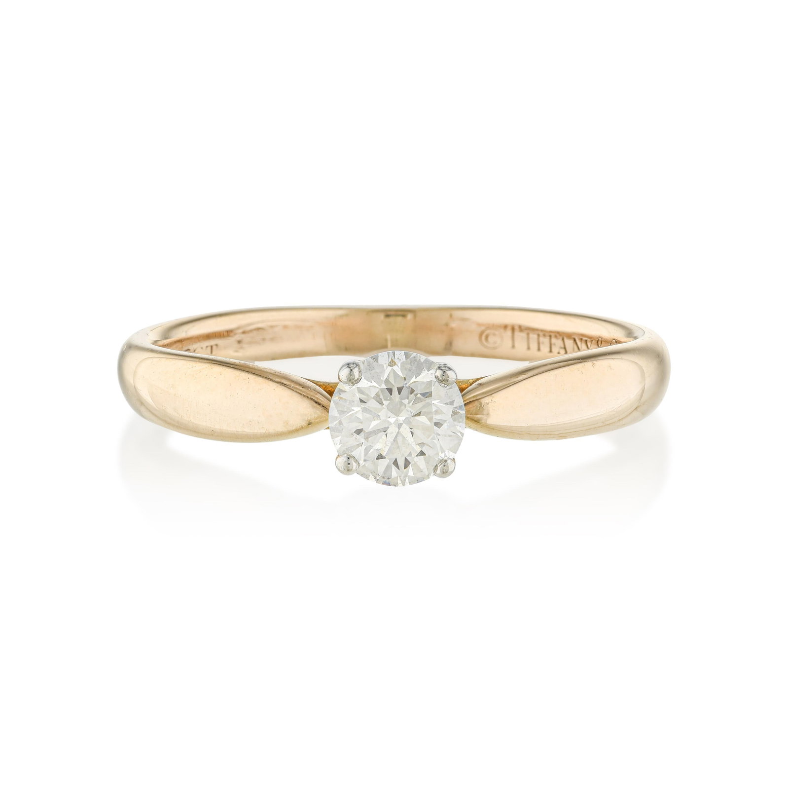Tiffany and Co. Diamond Solitaire Ring, with Box: ESTIMATED RETAIL PRICE: $2,500* *This is the estimated value a piece of similar quality, craftsmanship, and characteristics could command at retail. The Tiffany solitaire in its most minimal form is