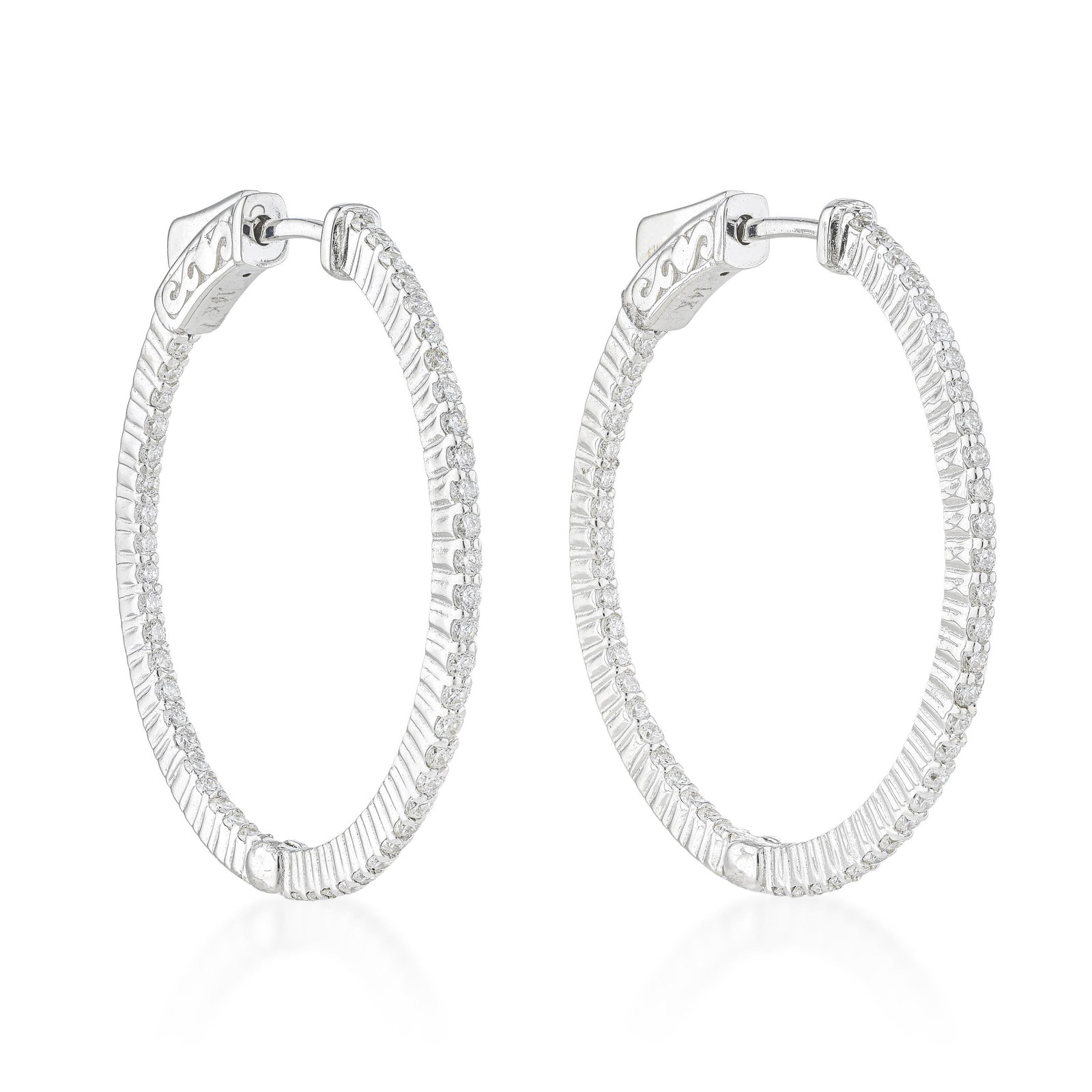 Diamond Hoop Earrings (Approx. 1.00 CTW): ESTIMATED RETAIL PRICE: $3,000* *This is the estimated value a piece of similar quality, craftsmanship, and characteristics could command at retail. Yellow gold diamond hoops offer a warmth that the