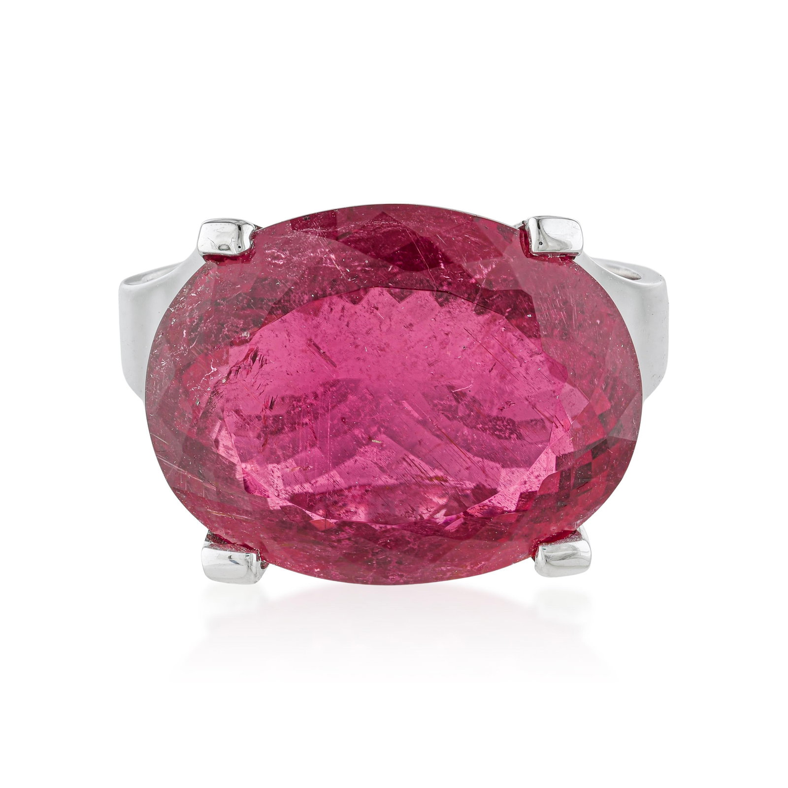 Ruby and Diamond Ring: ESTIMATED RETAIL PRICE: $14,000* *This is the estimated value a piece of similar quality, craftsmanship, and characteristics could command at retail. A ruby of 7.40 carats in an oval cut occupies