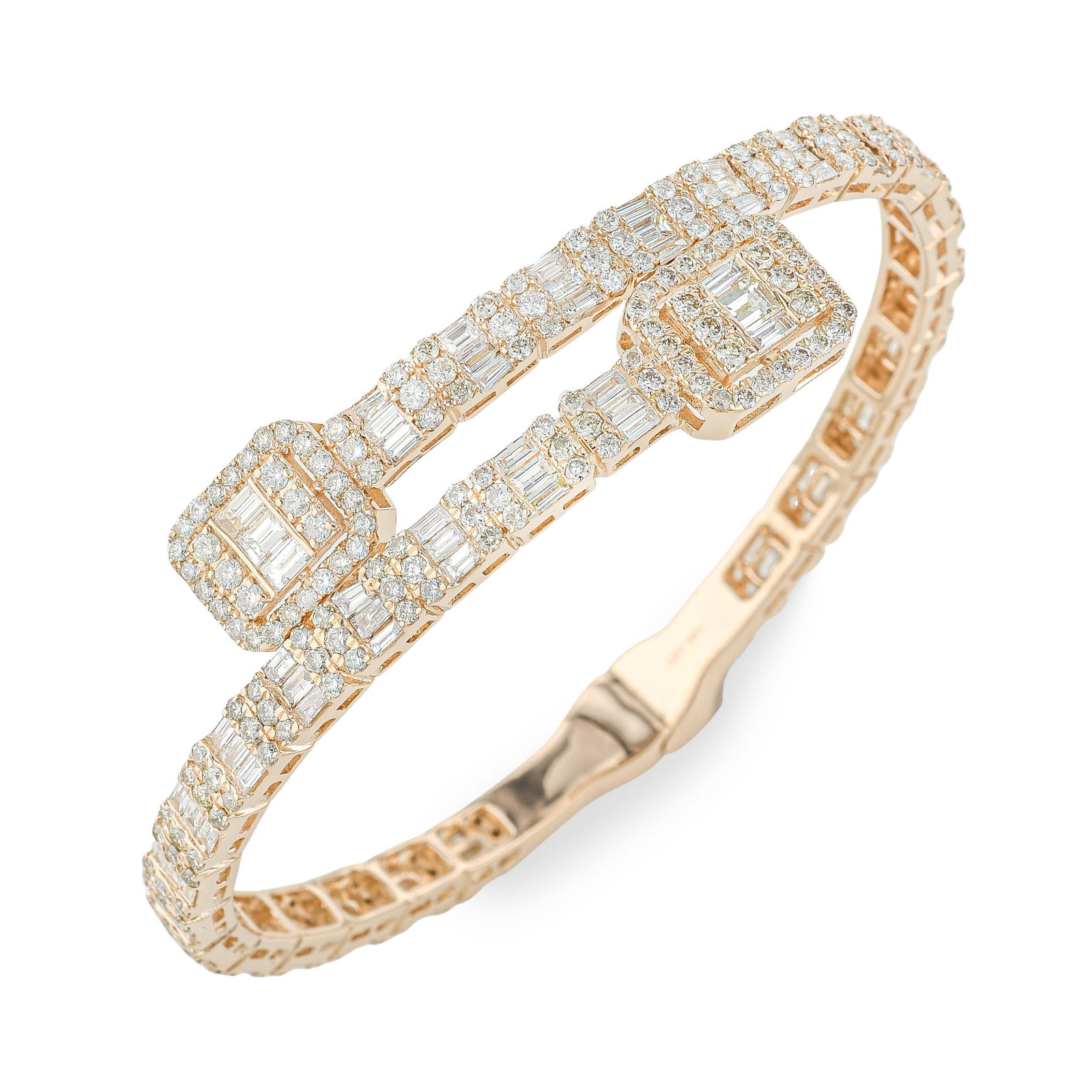 Rose Gold Diamond Bangle: ESTIMATED RETAIL PRICE: $9,500* *This is the estimated value a piece of similar quality, craftsmanship, and characteristics could command at retail. A flexible diamond bangle in 14K rose gold with