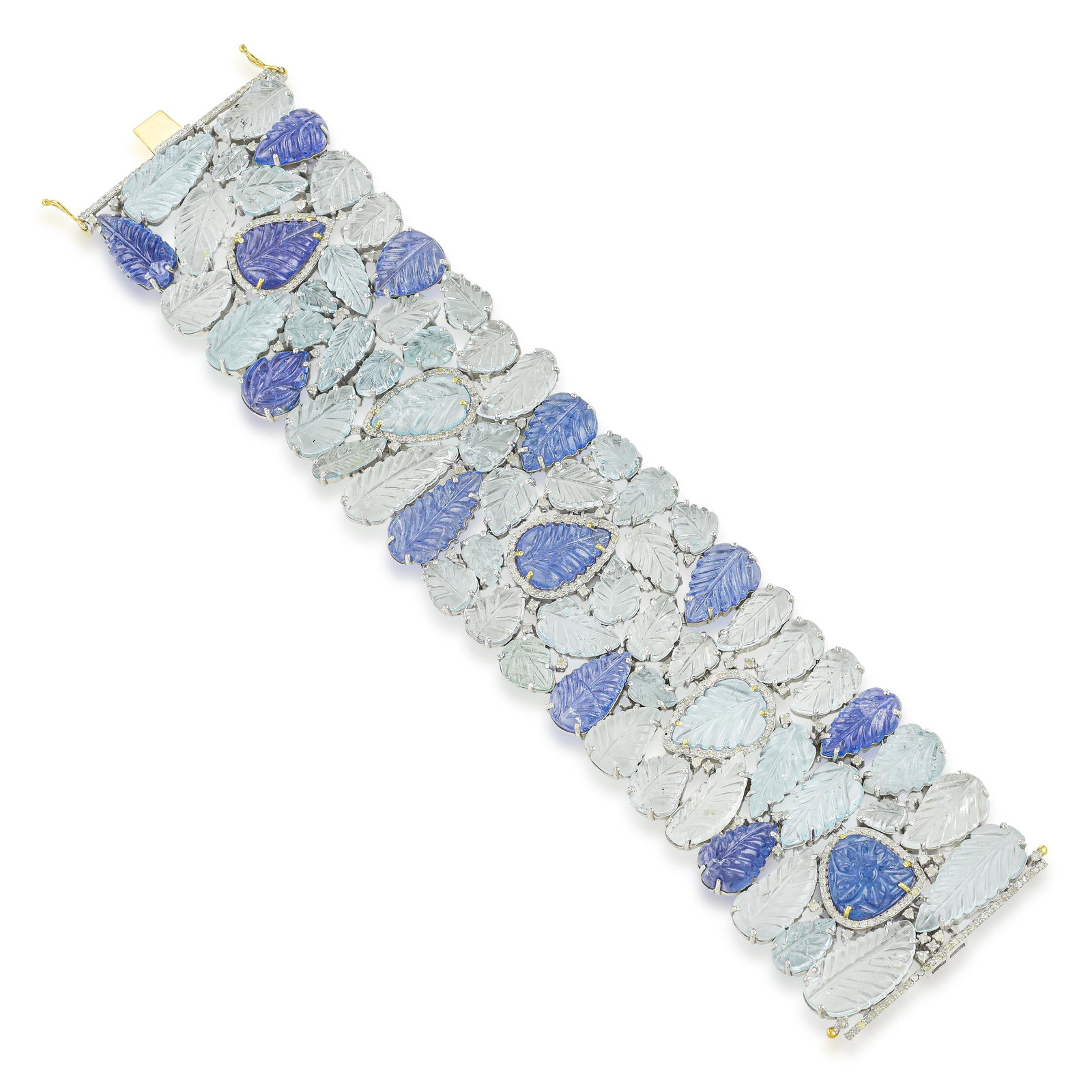 Hand Carved Aquamarine and Tanzanite Leaf and Diamond Bracelet - No Reserve: ESTIMATED RETAIL PRICE: $6,500* *This is the estimated value a piece of similar quality, craftsmanship, and characteristics could command at retail. Carving gemstones at this scale requires lapidary