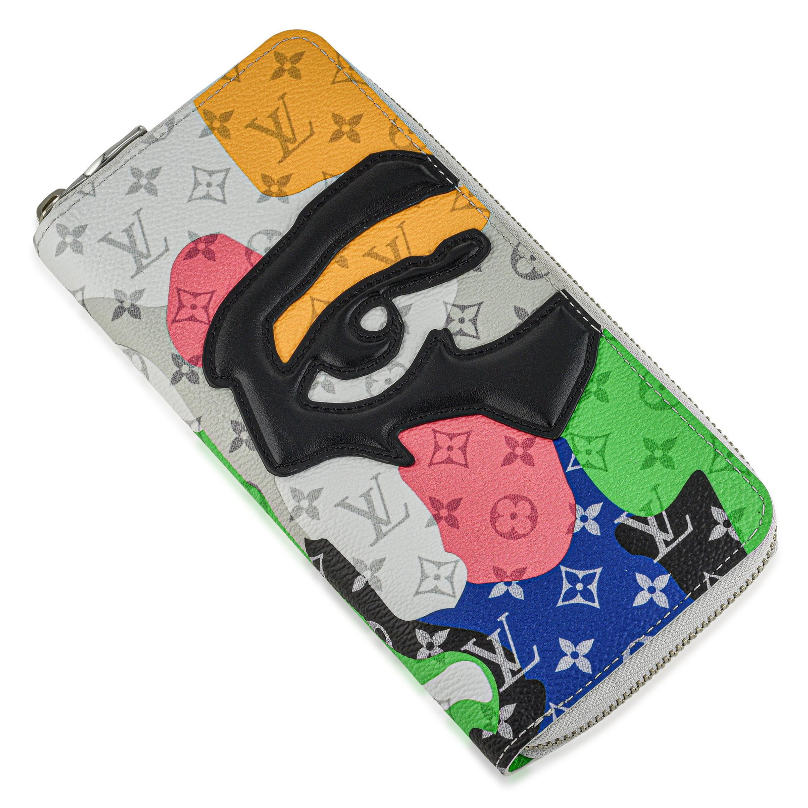 Louis Vuitton Monogram "LV Portrait" Zippy Vertical Wallet: This Louis Vuitton Monogram LV Portrait Zippy Vertical Wallet is a modern reinterpretation of the classic LV Zippy design. Crafted in durable Monogram coated canvas, this special-edition model feature
