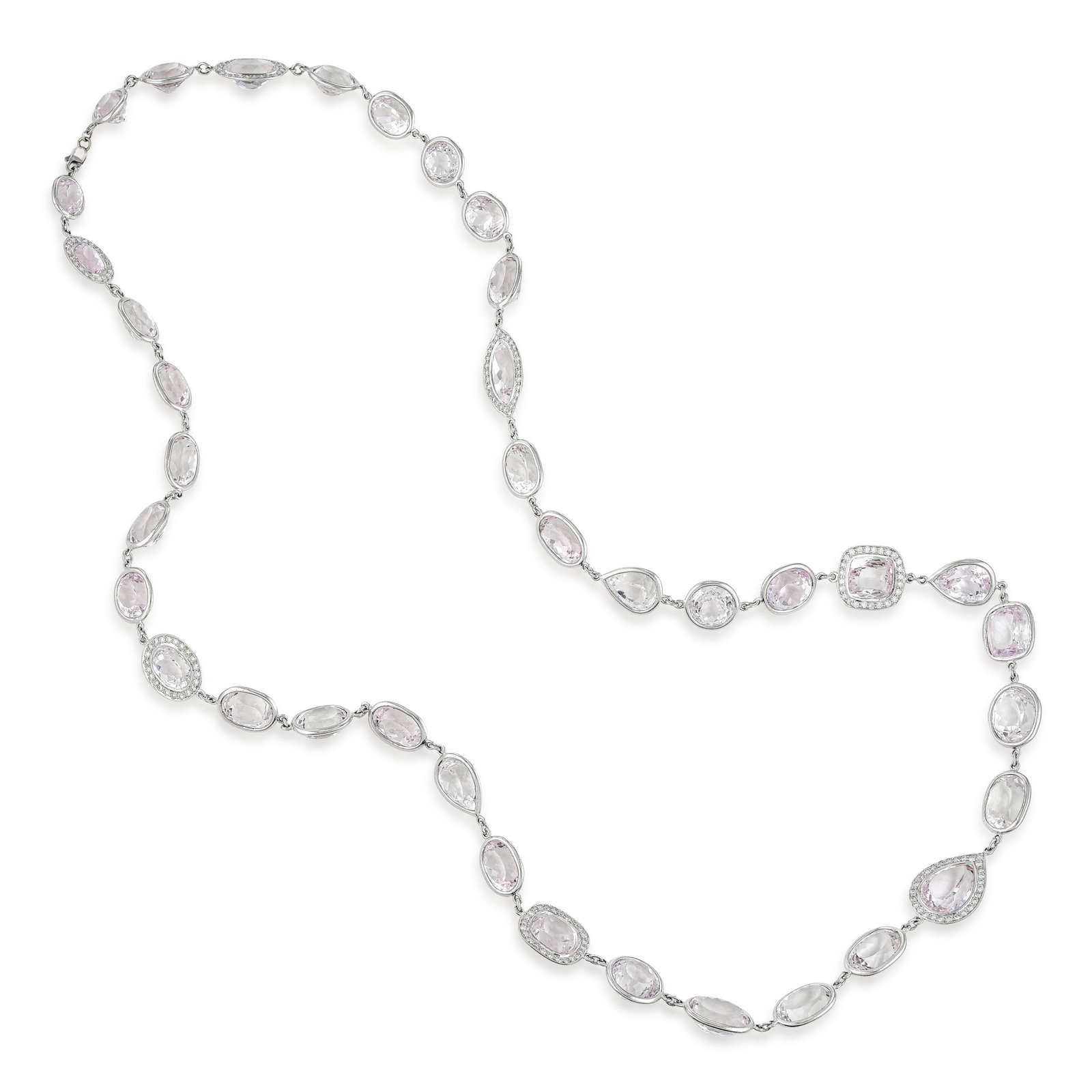 Kunzite Long Chain: ESTIMATED RETAIL PRICE: $30,000 * *This is the estimated value a piece of similar quality, craftsmanship, and characteristics could command at retail. Two hundred and nine carats of kunzite across a 3