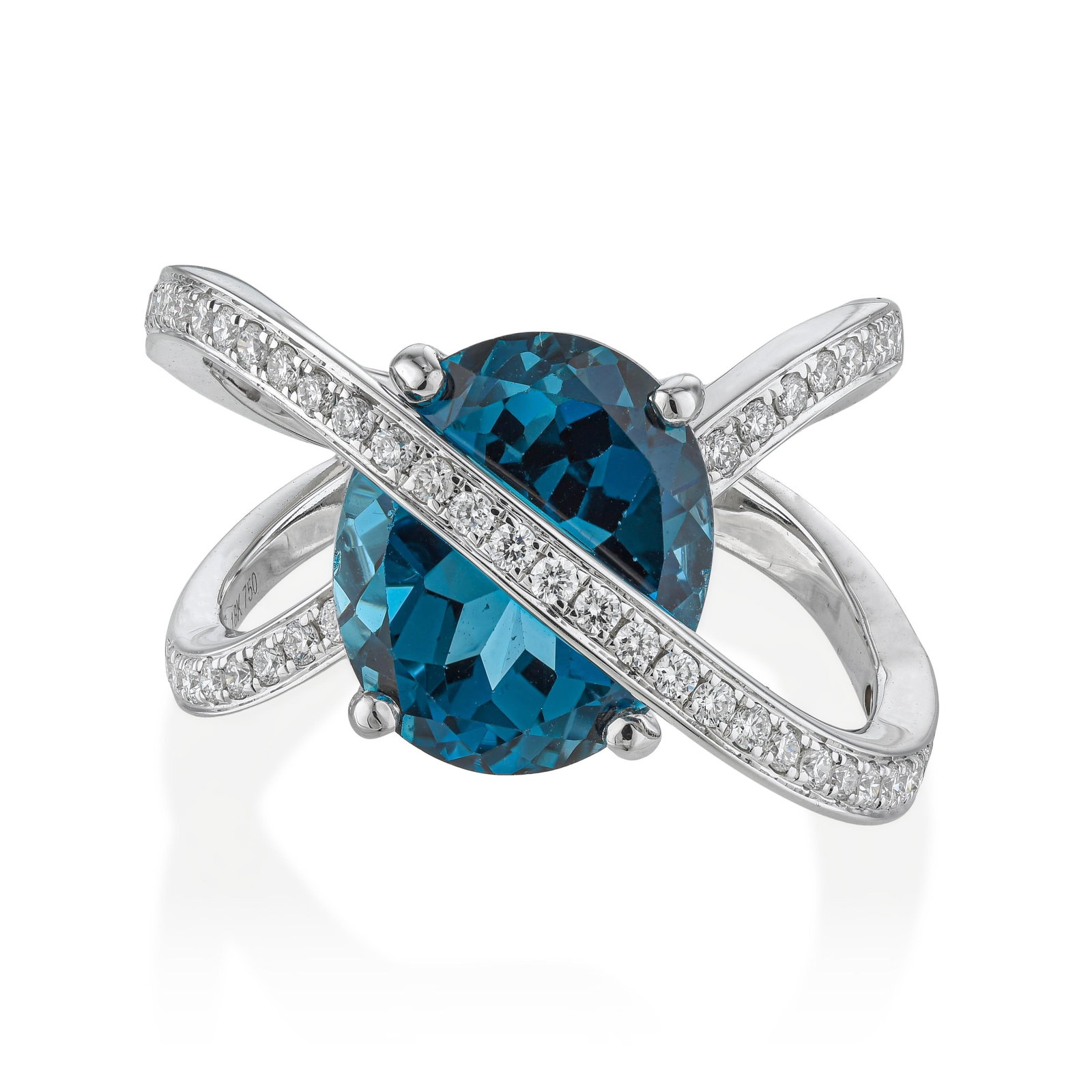 Blue Topaz and Diamond Crossover Ring: ESTIMATED RETAIL PRICE: $5,500* *This is the estimated value a piece of similar quality, craftsmanship, and characteristics could command at retail. Crossover ring designs allow two stones — here a 