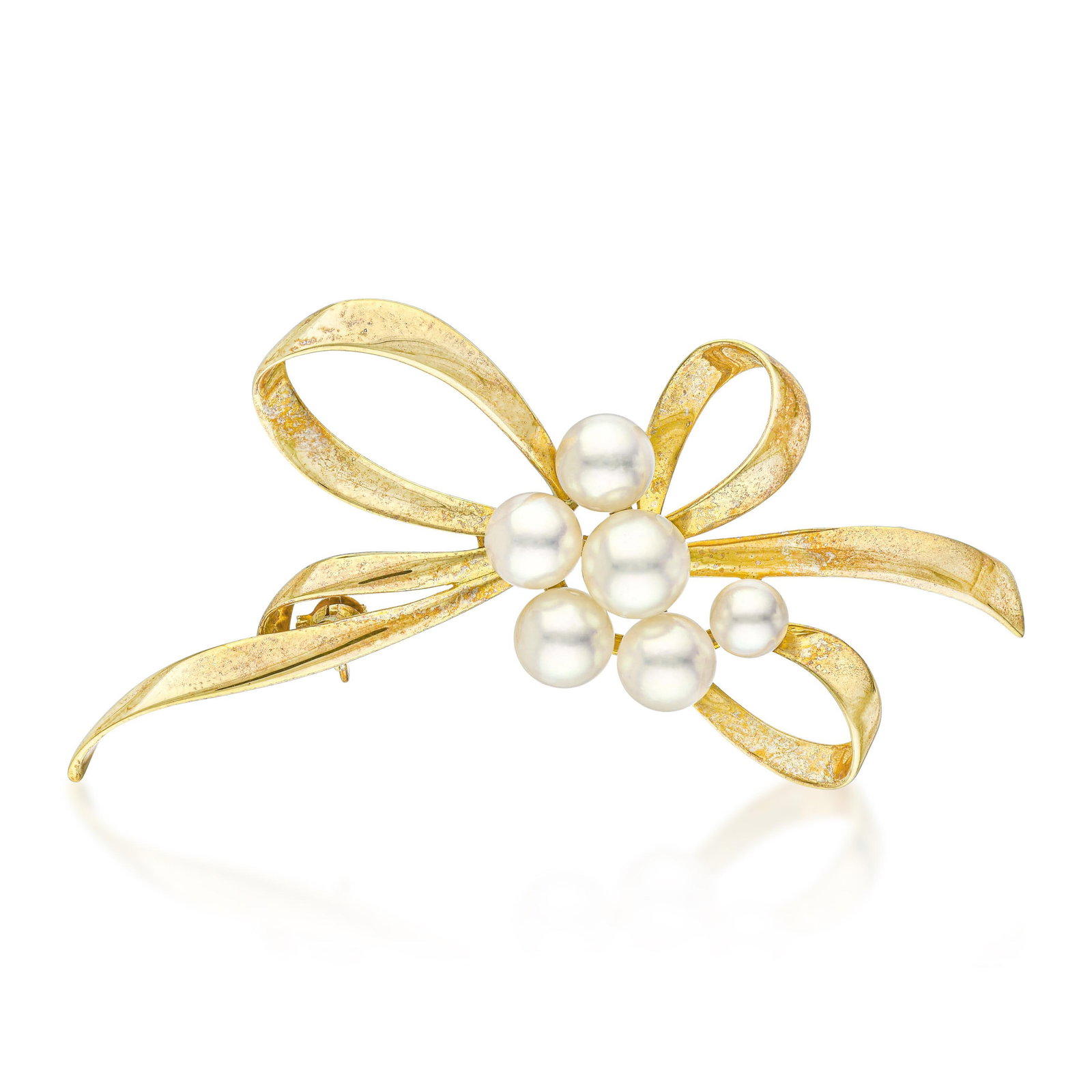 Vintage Mikimoto Pearl Brooch: ESTIMATED RETAIL PRICE: $3,500* *This is the estimated value a piece of similar quality, craftsmanship, and characteristics could command at retail. Summary of Key Characteristics • Metal: 18K ye