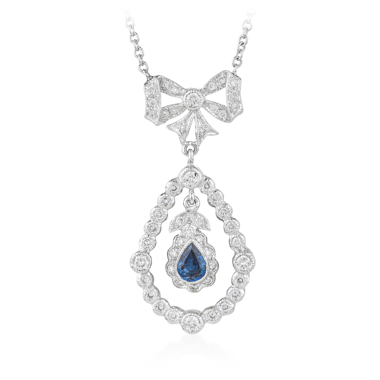 Sapphire and Diamond Bow Pendant Necklace: ESTIMATED RETAIL PRICE: $2,500* *This is the estimated value a piece of similar quality, craftsmanship, and characteristics could command at retail. Summary of Key Characteristics • Metal: 18K wh