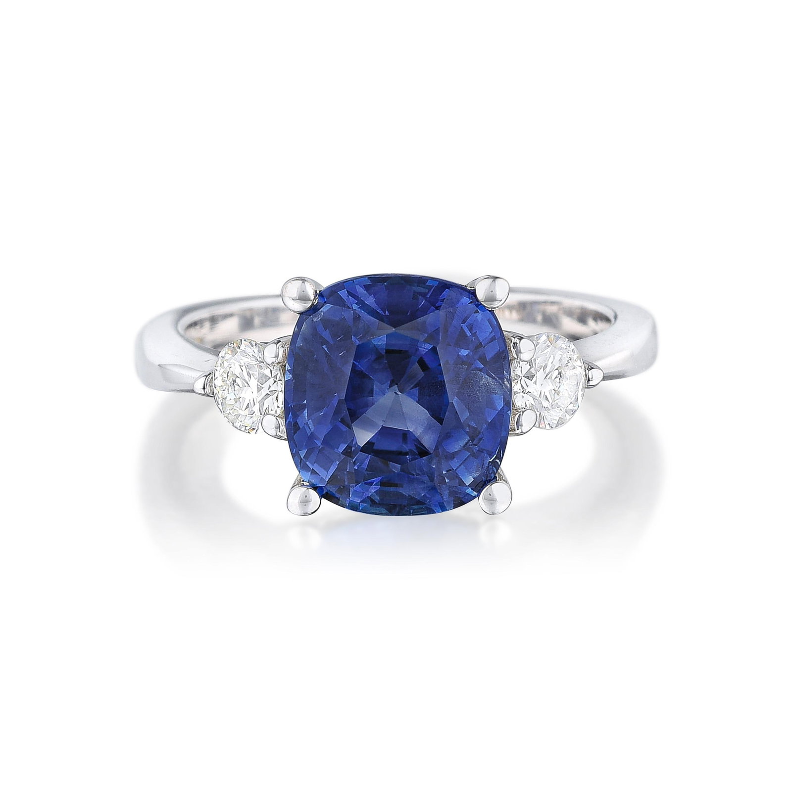 Sapphire and Diamond Three-Stone Ring: ESTIMATED RETAIL PRICE: $5,500* *This is the estimated value a piece of similar quality, craftsmanship, and characteristics could command at retail. Summary of Key Characteristics • Metal: 18K wh