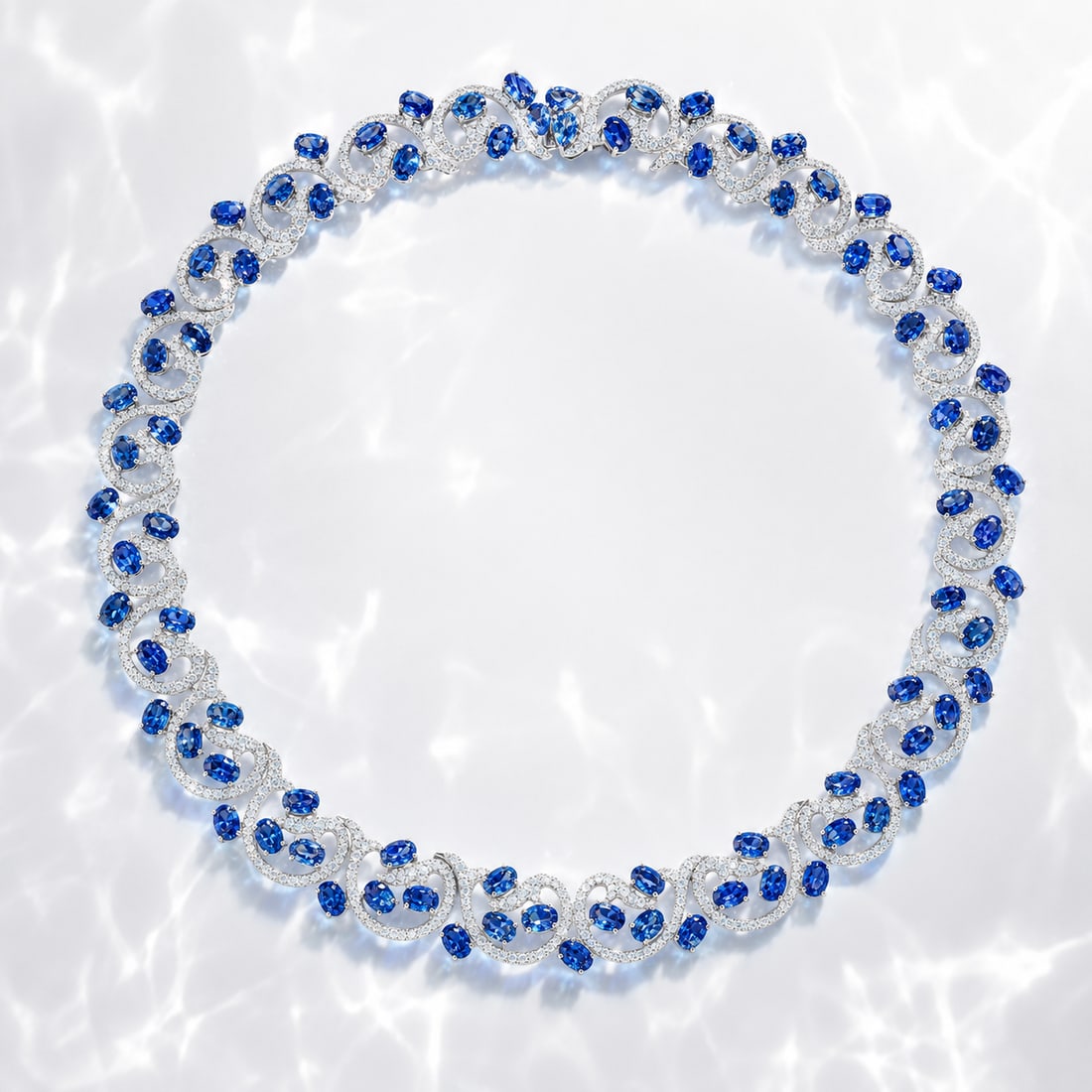 Blue Sapphire and Diamond Necklace: ESTIMATED RETAIL PRICE: $55,000 * *This is the estimated value a piece of similar quality, craftsmanship, and characteristics could command at retail. Fifty-four carats of blue sapphires across a