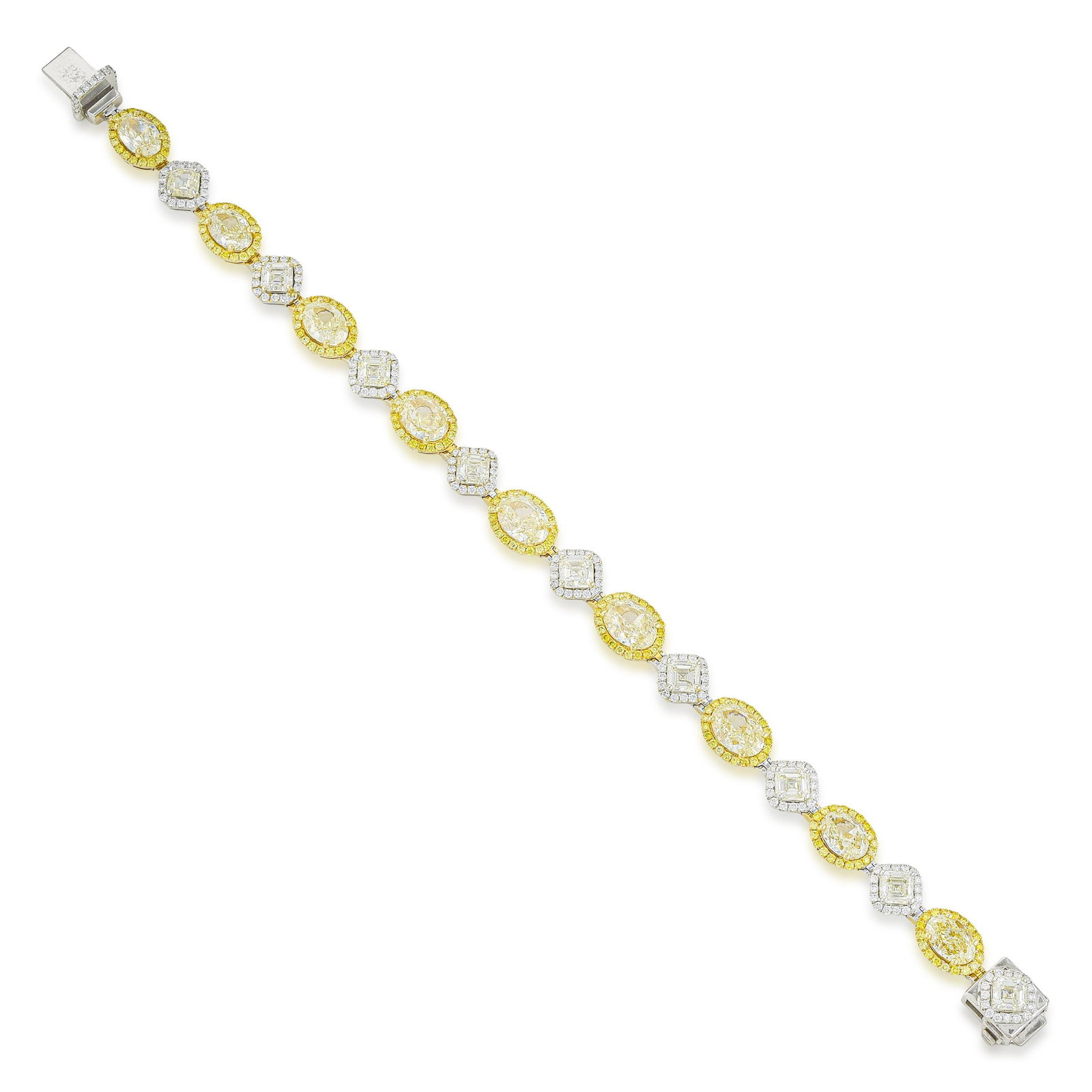 Fancy Yellow and White Diamond Bracelet: ESTIMATED RETAIL PRICE: $65,000 * *This is the estimated value a piece of similar quality, craftsmanship, and characteristics could command at retail. Fancy vivid yellow is the highest saturation
