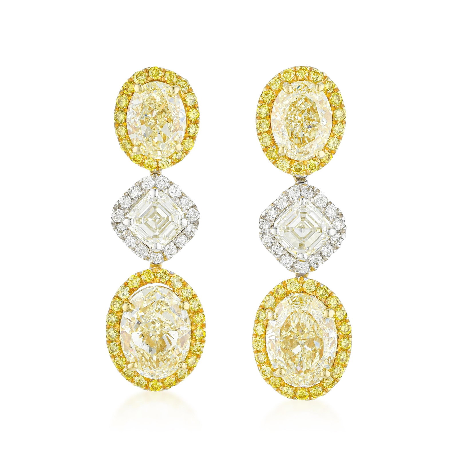 Fancy Yellow and White Diamond Drop Earrings: ESTIMATED RETAIL PRICE: $22,000 * *This is the estimated value a piece of similar quality, craftsmanship, and characteristics could command at retail. These earrings move through three diamond color
