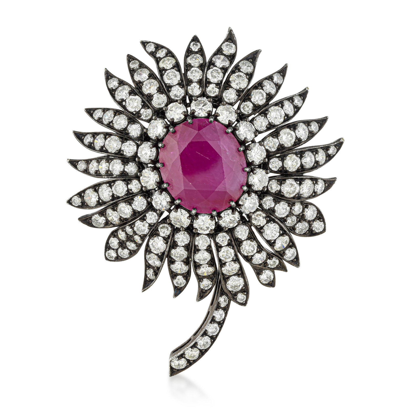 Ruby and Diamond Flower Pin: ESTIMATED RETAIL PRICE: $50,000* *This is the estimated value a piece of similar quality, craftsmanship, and characteristics could command at retail. The black rhodium finish on platinum is a