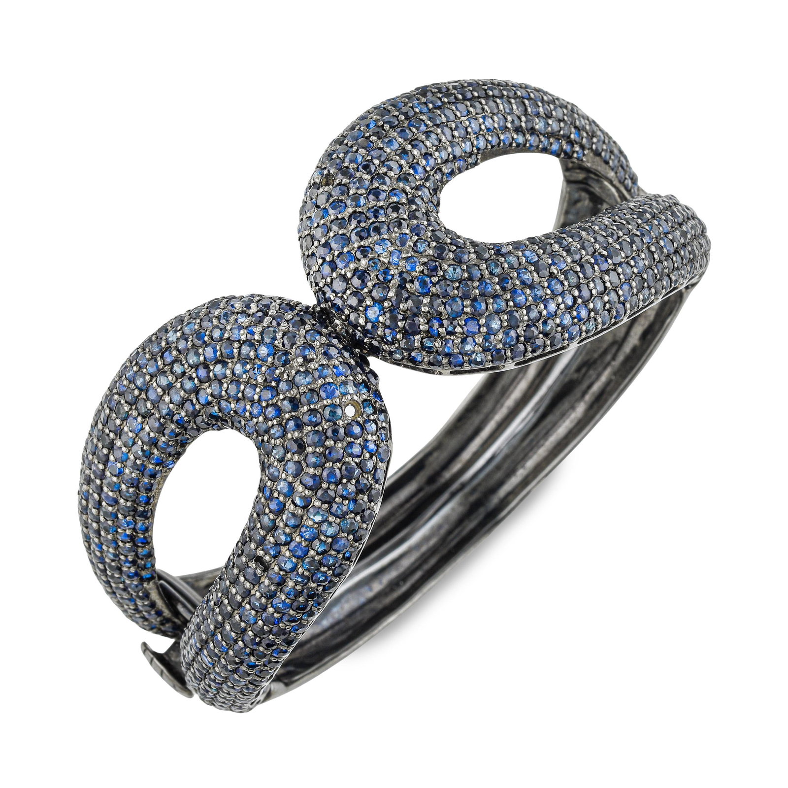 Blue Sapphire Bangle - No Reserve: ESTIMATED RETAIL PRICE: $2,200* *This is the estimated value a piece of similar quality, craftsmanship, and characteristics could command at retail. Nearly 26 carats of blue sapphire in a bangle