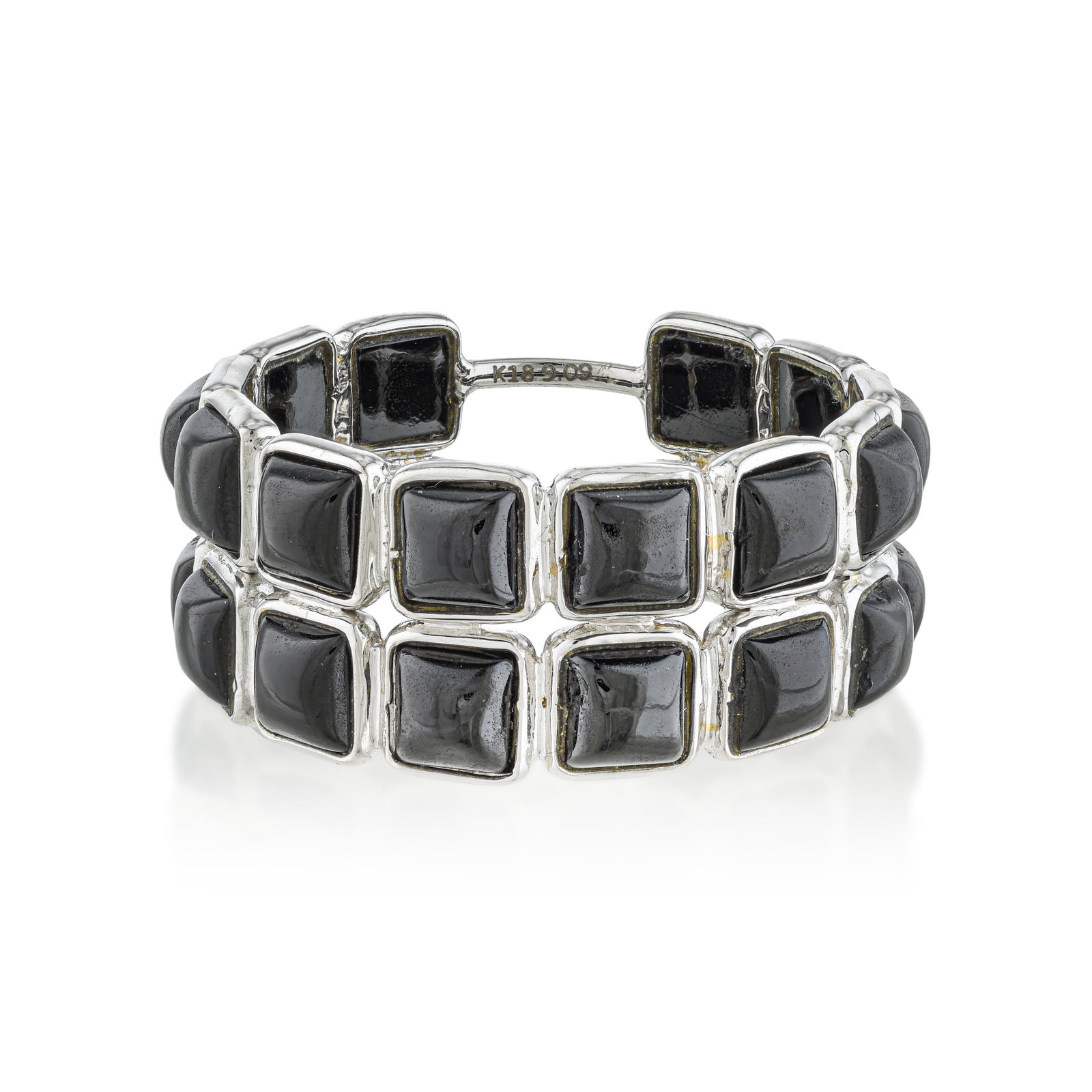 Black Spinel Double Stack Band Ring: ESTIMATED RETAIL PRICE: $1,200 * *This is the estimated value a piece of similar quality, craftsmanship, and characteristics could command at retail. Black spinel occupies a collector niche that
