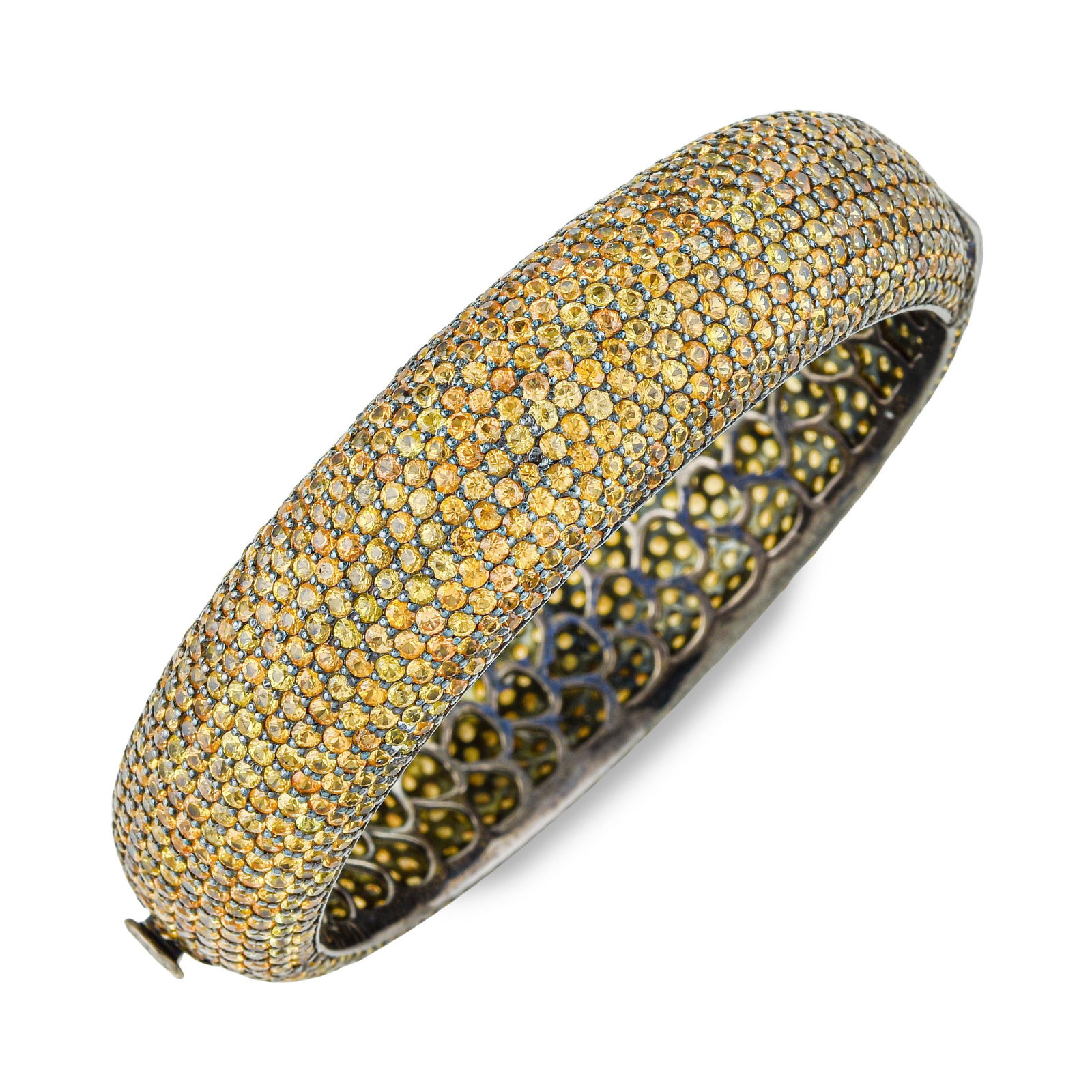 Yellow Sapphire Bangle: ESTIMATED RETAIL PRICE: $2,800* *This is the estimated value a piece of similar quality, craftsmanship, and characteristics could command at retail. Yellow sapphire at nearly 34 carats delivers a warm