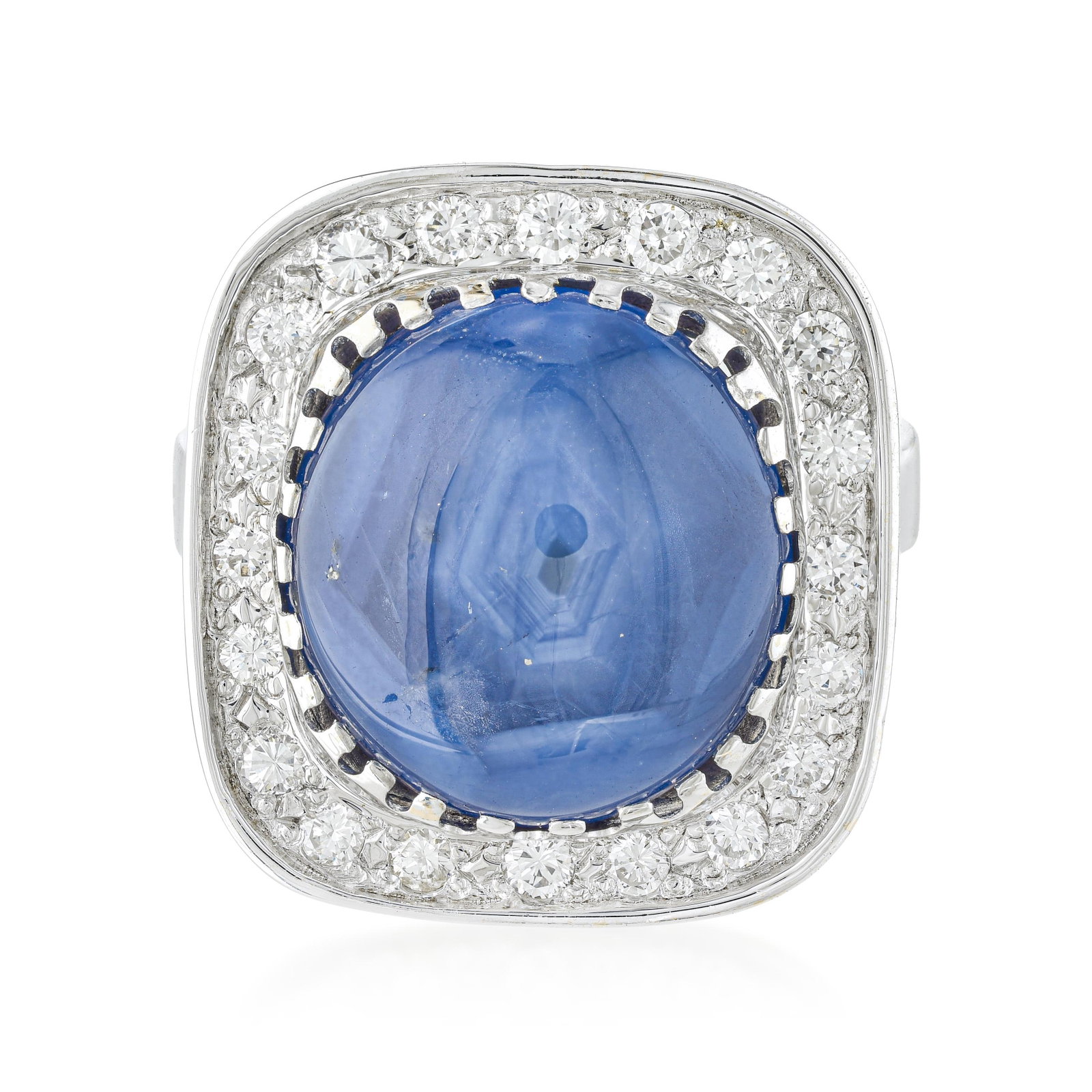 Star Sapphire and Diamond Ring: ESTIMATED RETAIL PRICE: $6,500* *This is the estimated value a piece of similar quality, craftsmanship, and characteristics could command at retail. Asterism in sapphire is produced by microscopic rut