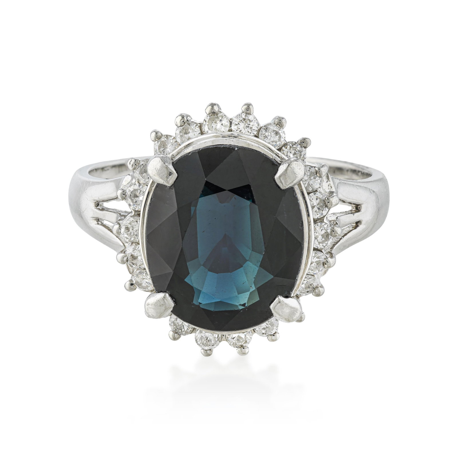 Sapphire and Diamond Ring: ESTIMATED RETAIL PRICE: $3,800* *This is the estimated value a piece of similar quality, craftsmanship, and characteristics could command at retail. A 3.45-carat oval sapphire in a diamond-accented
