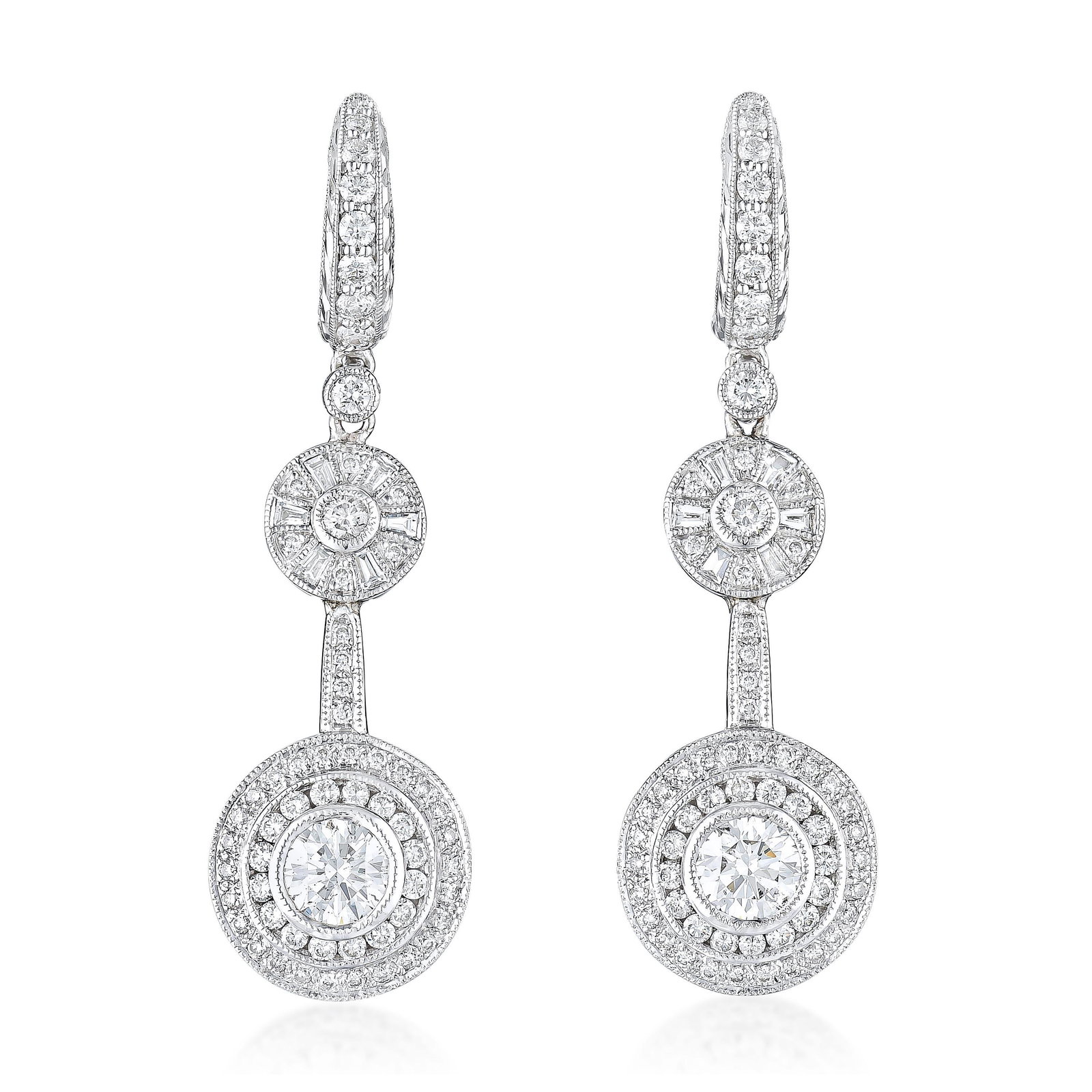 Diamond Drop Earrings: ESTIMATED RETAIL PRICE: 12,000* *This is the estimated value a piece of similar quality, craftsmanship, and characteristics could command at retail. Combining round brilliant centers with tapered