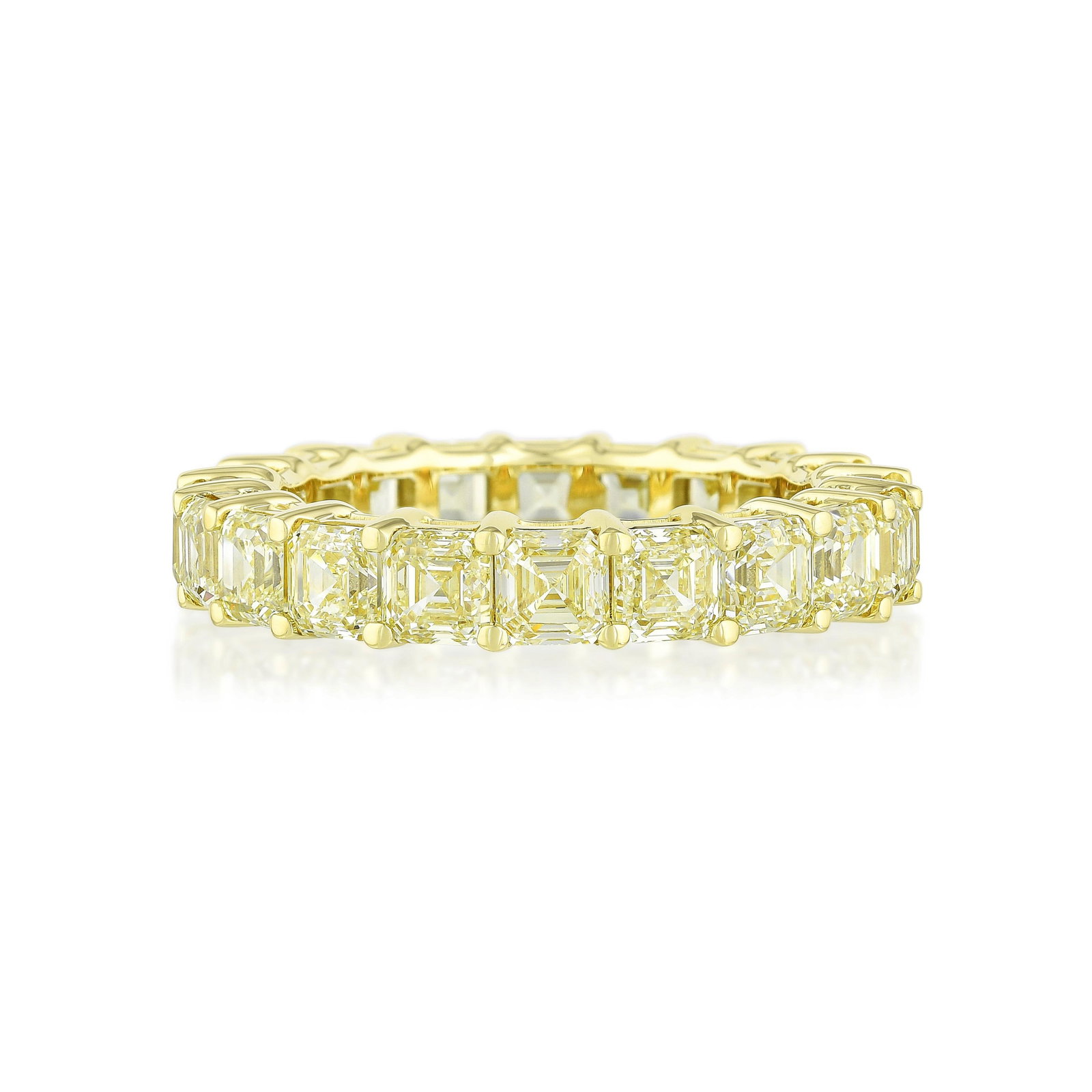 Asscher Cut Colored Diamond Eternity Band: ESTIMATED RETAIL PRICE: $16,000* *This is the estimated value a piece of similar quality, craftsmanship, and characteristics could command at retail. Summary of Key Characteristics • Metal: 18K