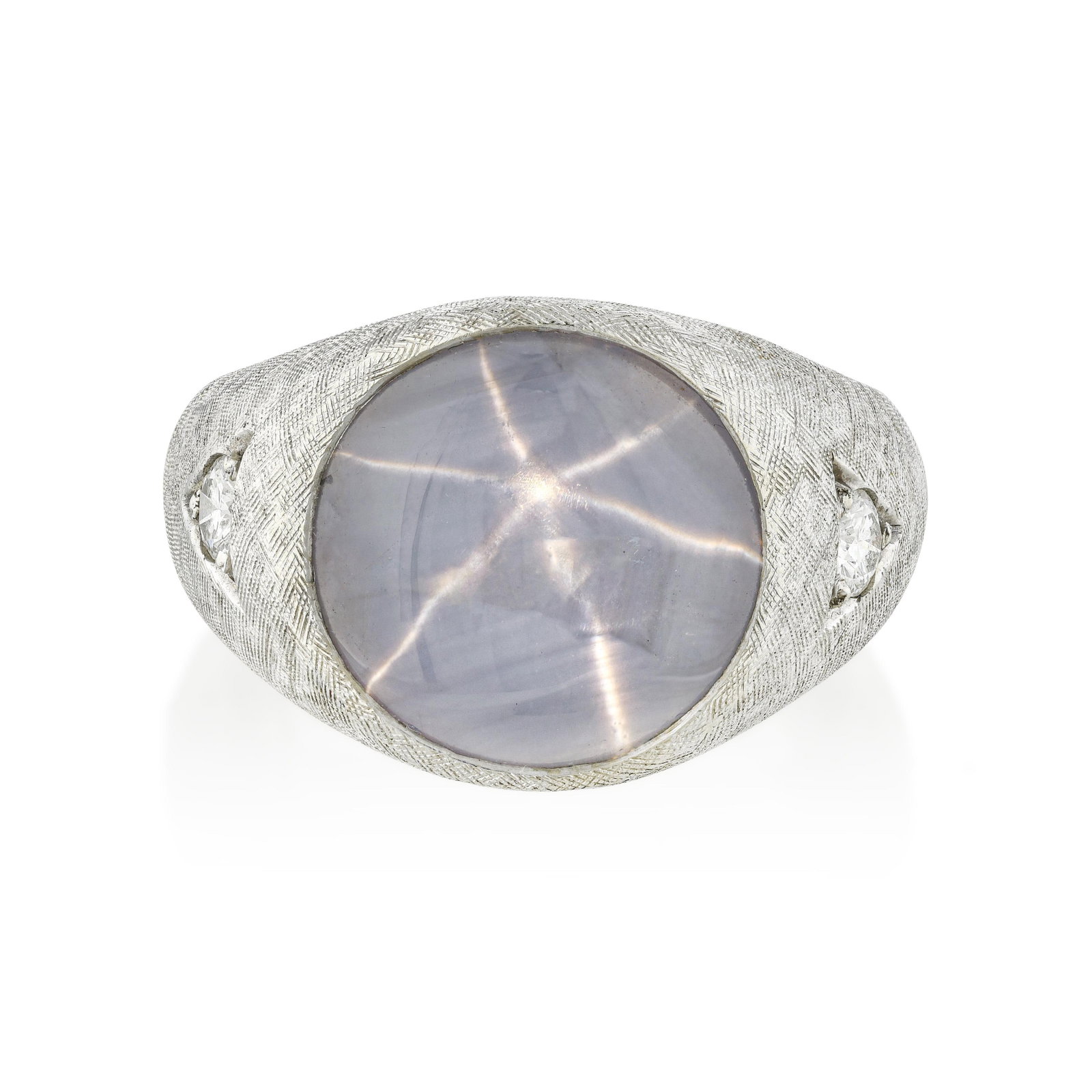 Star Sapphire and Diamond Ring: ESTIMATED RETAIL PRICE: $3,500 * *This is the estimated value a piece of similar quality, craftsmanship, and characteristics could command at retail. Asterism in sapphire, the six-rayed star produced