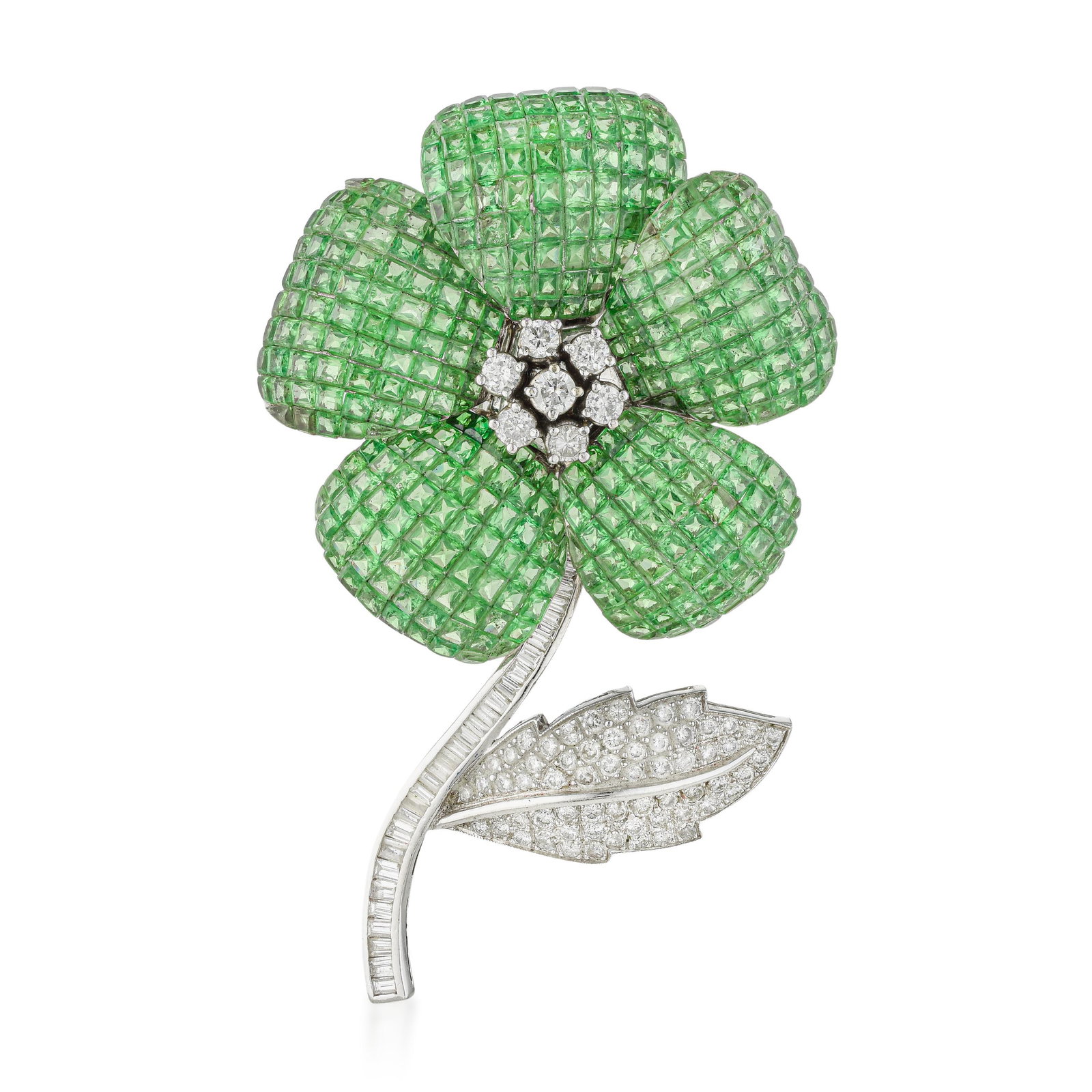 Tsavorite and Diamond Flower Pin: ESTIMATED RETAIL PRICE: $32,000* *This is the estimated value a piece of similar quality, craftsmanship, and characteristics could command at retail. Tsavorite is the green garnet discovered in East A