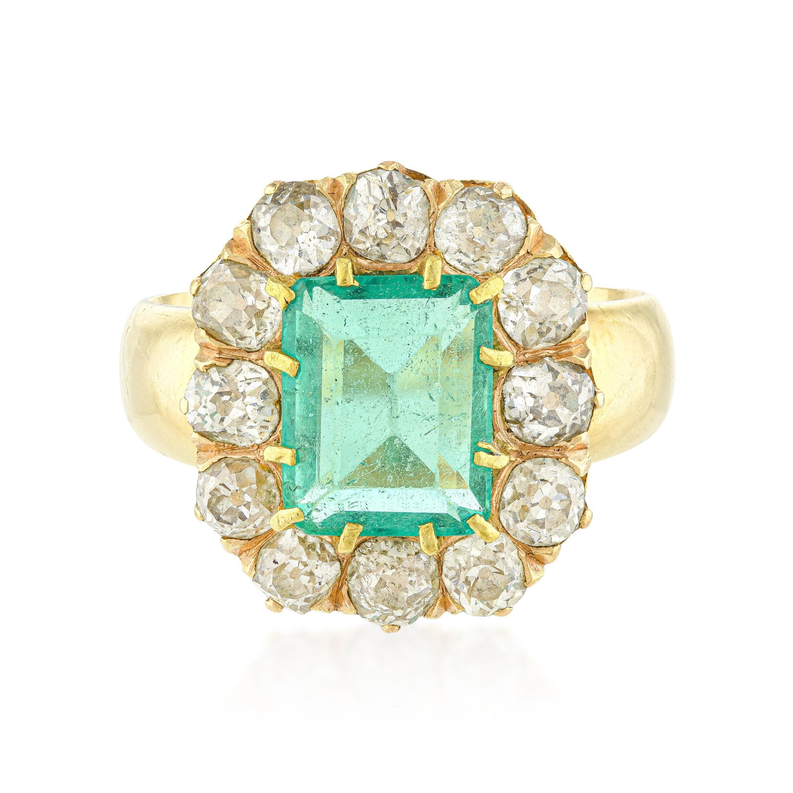 Victorian Emerald and Diamond Cluster Ring: ESTIMATED RETAIL PRICE: $9,000* *This is the estimated value a piece of similar quality, craftsmanship, and characteristics could command at retail. Old European cut diamonds are the defining marker