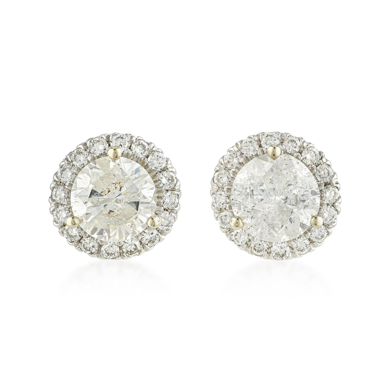 Diamond Stud Earrings (Approx. 2.44 CTW): ESTIMATED RETAIL PRICE: $5,500* *This is the estimated value a piece of similar quality, craftsmanship, and characteristics could command at retail. A diamond halo stud earring solves what a plain sol