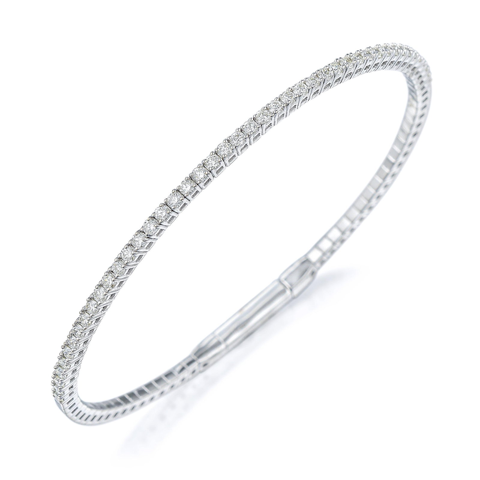 Diamond Flex Bracelet: ESTIMATED RETAIL PRICE: $3,600* *This is the estimated value a piece of similar quality, craftsmanship, and characteristics could command at retail. F-G color diamonds in white gold appear to radiate