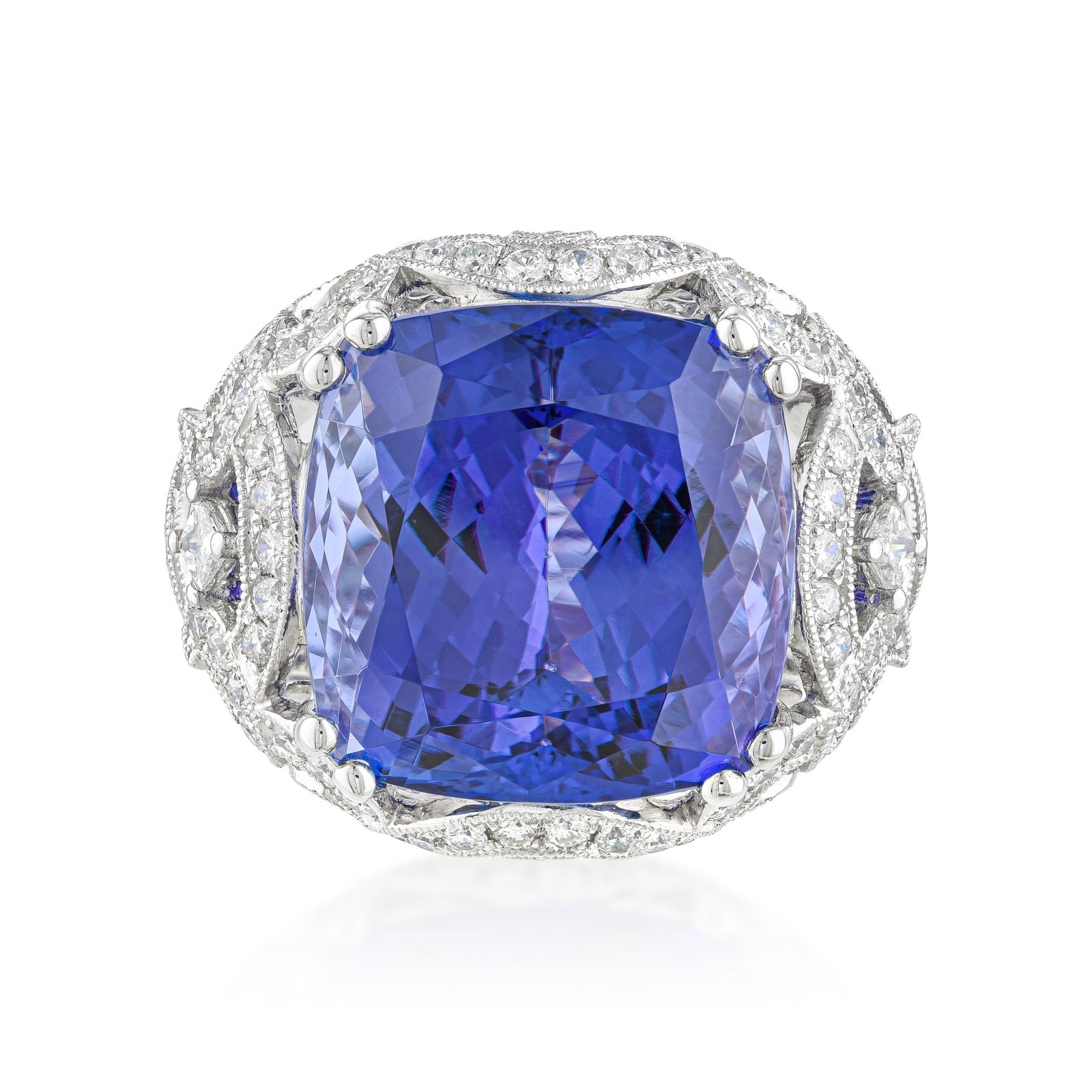 19.91-Carat Tanzanite and Diamond Ring: ESTIMATED RETAIL PRICE: $21,500* *This is the estimated value a piece of similar quality, craftsmanship, and characteristics could command at retail. Approaching twenty carats, this tanzanite sits at