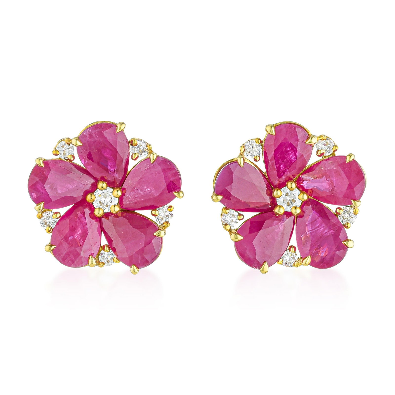 Ruby and Diamond Floral Cluster Earrings: ESTIMATED RETAIL PRICE: $7,500* *This is the estimated value a piece of similar quality, craftsmanship, and characteristics could command at retail. Nearly five carats of ruby across 10 stones in a 13