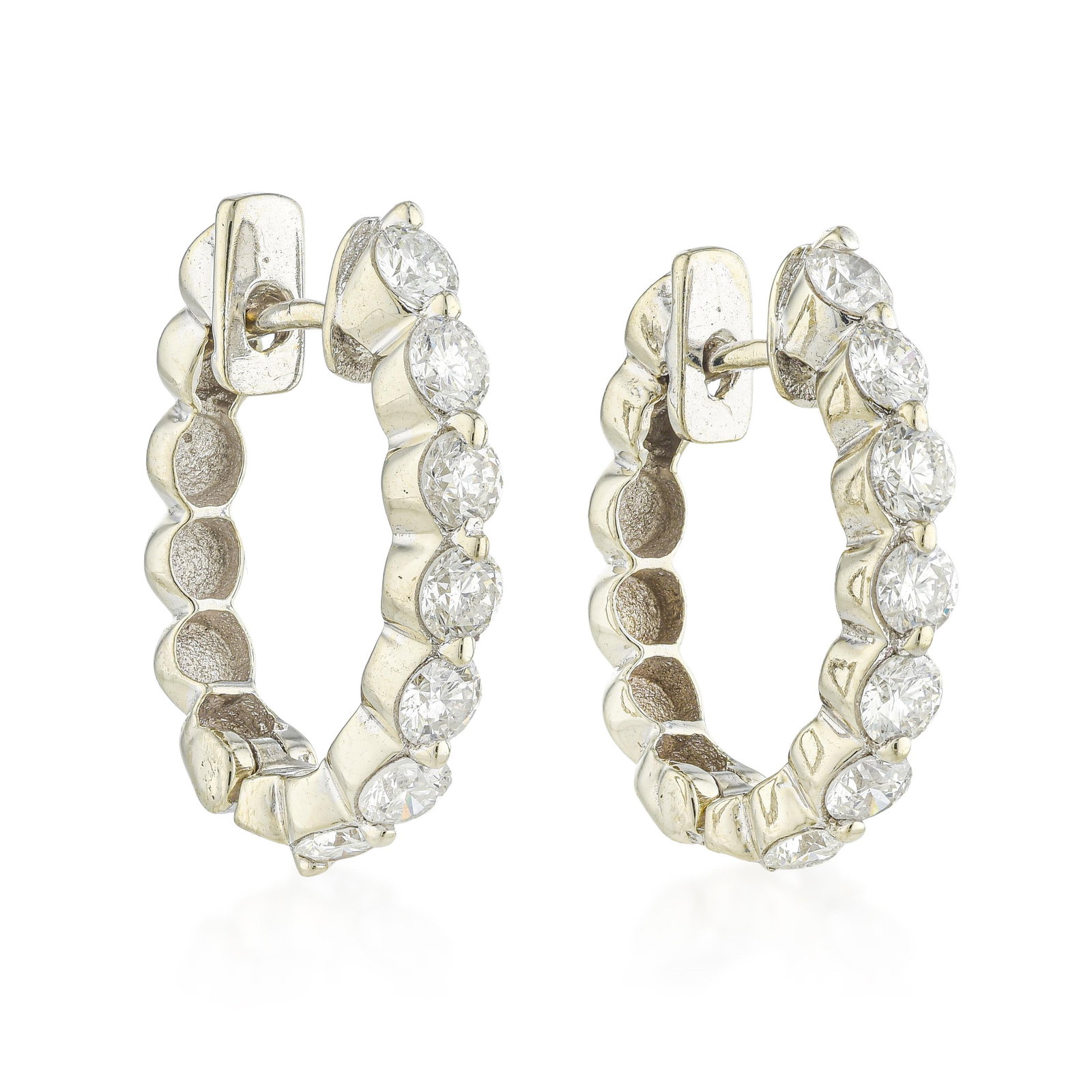 Diamond Half Hoop Earrings: ESTIMATED RETAIL PRICE: $4,000* *This is the estimated value a piece of similar quality, craftsmanship, and characteristics could command at retail. The half hoop is the earring that solves the full