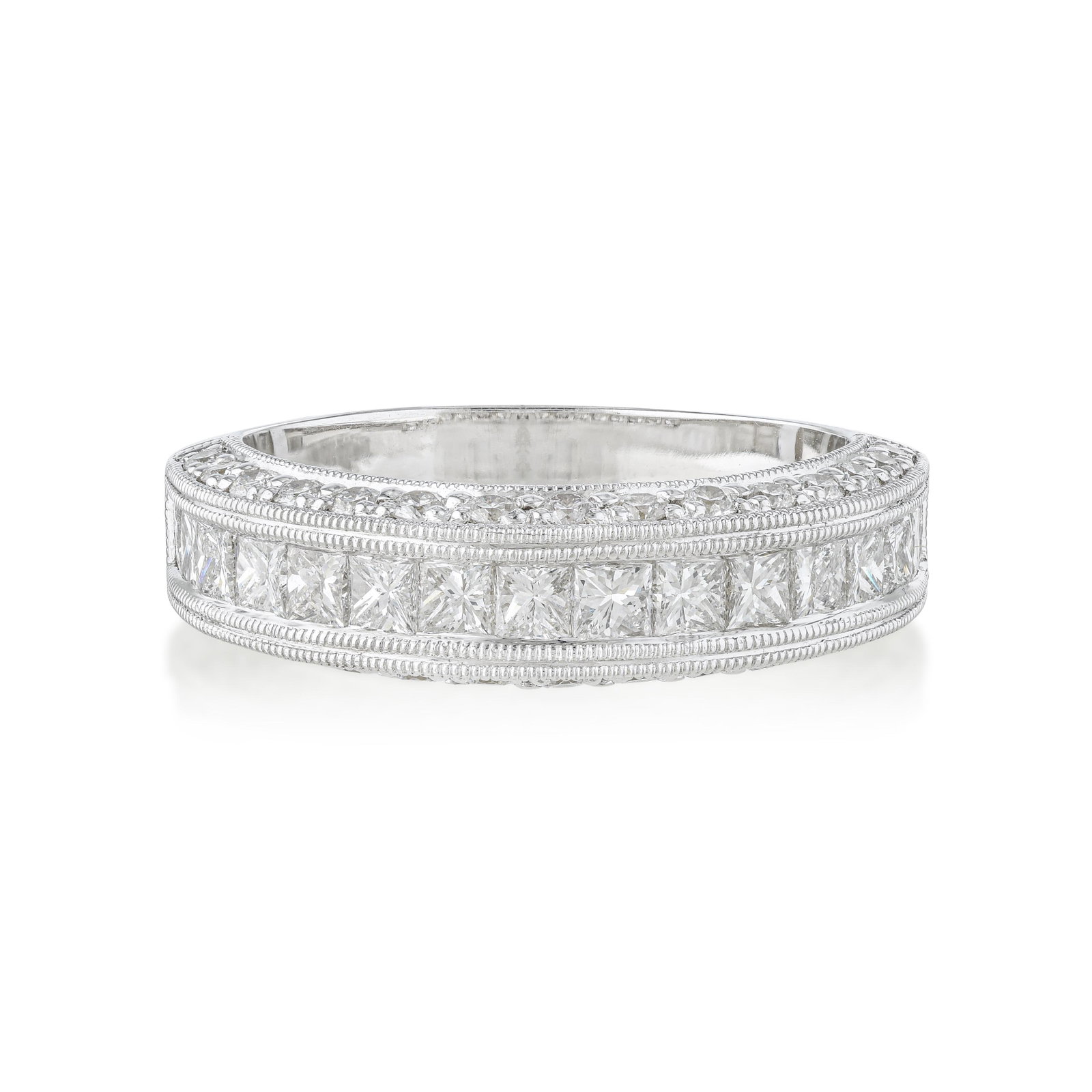 Diamond Pavé Ring: ESTIMATED RETAIL PRICE: $3,300 * *This is the estimated value a piece of similar quality, craftsmanship, and characteristics could command at retail. Princess cut pave across the face of a ring is a